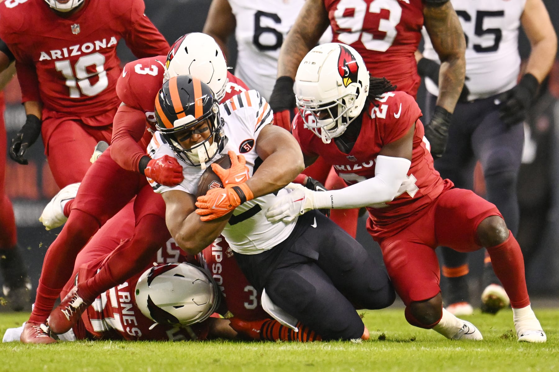 CHICAGO, ILLINOIS - DECEMBER 24: Khalil Herbert #24 of the Chicago Bears rushes for a first down during the first quarter against the Arizona Cardinals at Soldier Field on December 24, 2023 in Chicago, Illinois. (Photo by Quinn Harris/Getty Images)