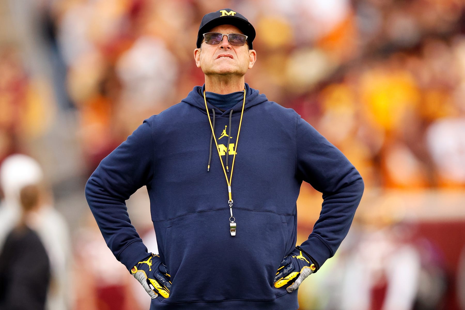 MINNEAPOLIS, MINNESOTA - OCTOBER 07: Head coach Jim Harbaugh of the Michigan Wolverines looks on prior to the start of the game against the Minnesota Golden Gophers at Huntington Bank Stadium on October 07, 2023 in Minneapolis, Minnesota. The Wolverines defeated the Golden Gophers 52-10. (Photo by David Berding/Getty Images)