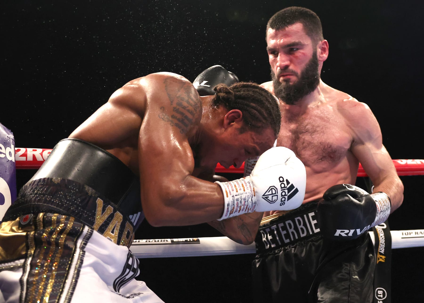 LONDON, ENGLAND - JANUARY 28: Anthony Yarde (L) and Artur Beterbiev (R) exchange punches during their WBC, IBF and WBO light heavyweight Championship fight at OVO Arena Wembley on January 28, 2023 in London, England. (Photo by Mark Robison/Top Rank Inc via Getty Images)