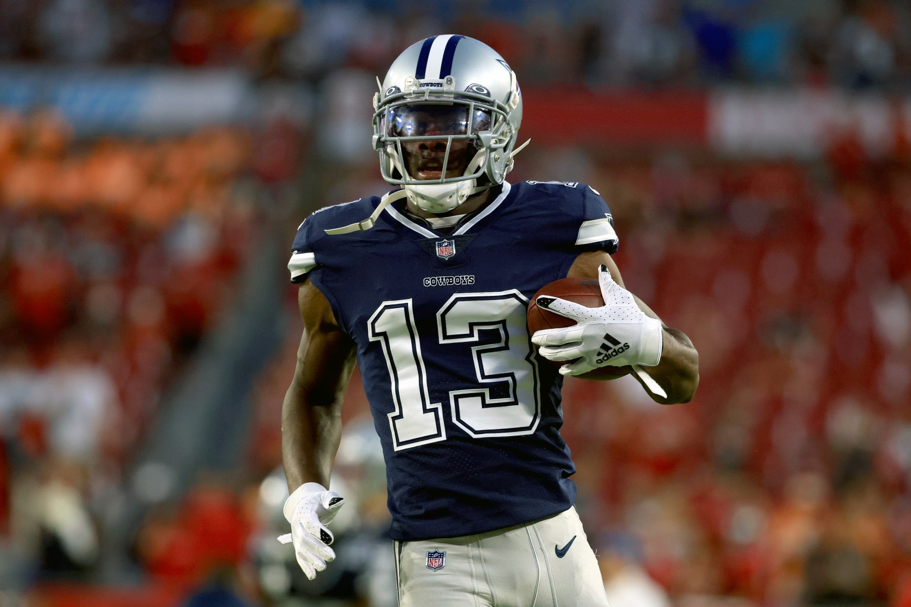 TAMPA, FLORIDA - SEPTEMBER 09: Michael Gallup #13 of the Dallas Cowboys warms up before the game against the Tampa Bay Buccaneers at Raymond James Stadium on September 09, 2021 in Tampa, Florida. (Photo by Mike Ehrmann/Getty Images)