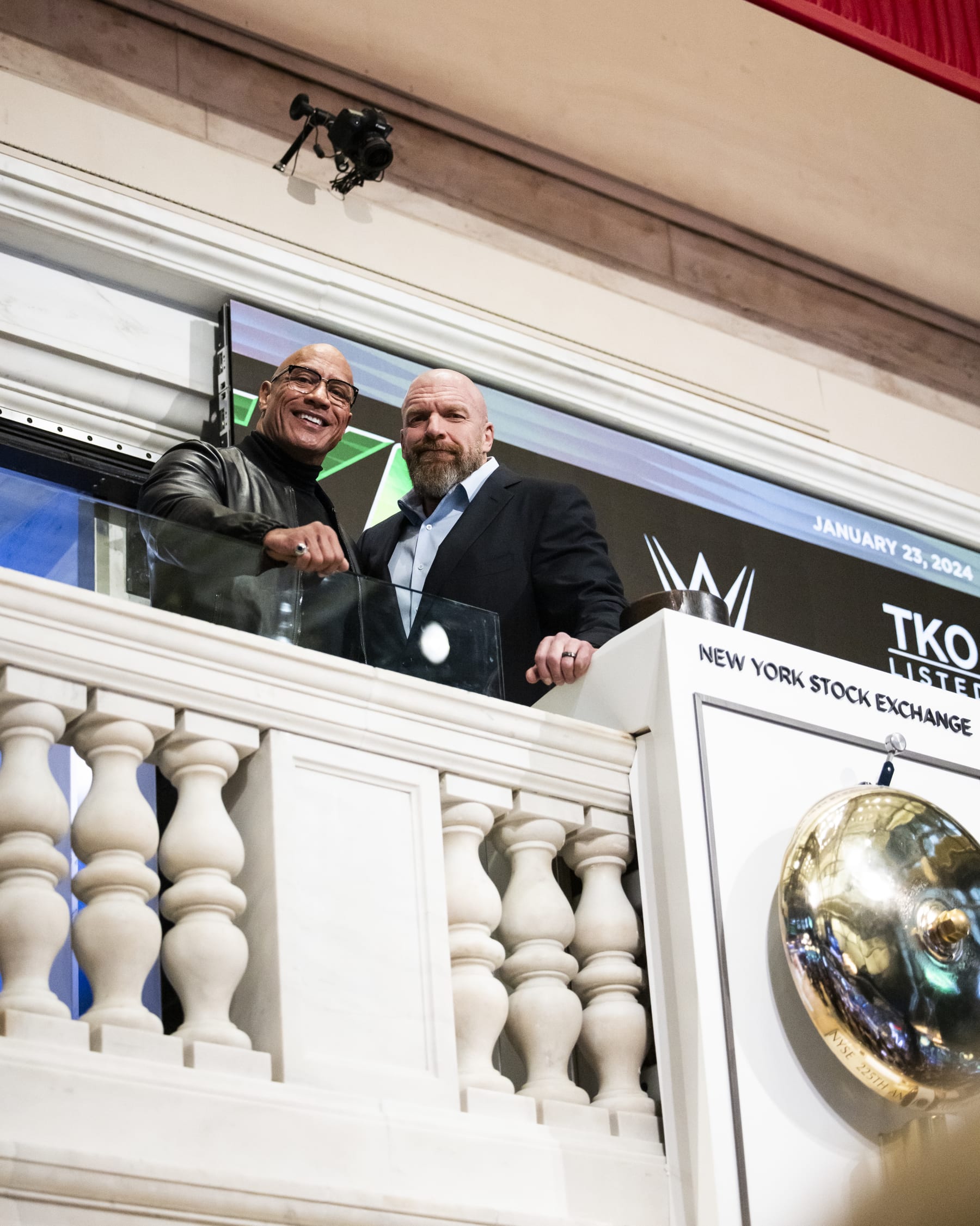 NEW YORK, NEW YORK - JANUARY 23: (L-R) Dwayne "The Rock" Johnson poses with WWE Chief Content Officer Paul Levesque during a ceremony to announce Johnson has joined the Board of Directors for TKO at New York Stock Exchange on January 23, 2024 in New York City. (Photo by Michelle Farsi/Zuffa LLC)