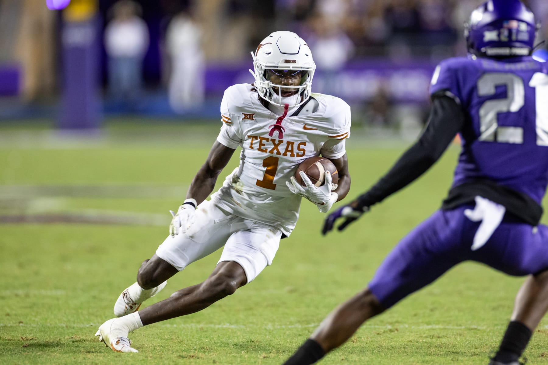 FORT WORTH, TX - NOVEMBER 11: Texas Longhorns wide receiver Xavier Worthy (#1) runs up field after a catch during the college football game between the Texas Longhorns and TCU Horned Frogs on November 11, 2023 at Amon G. Carter Stadium in Fort Worth, TX.  (Photo by Matthew Visinsky/Icon Sportswire via Getty Images)