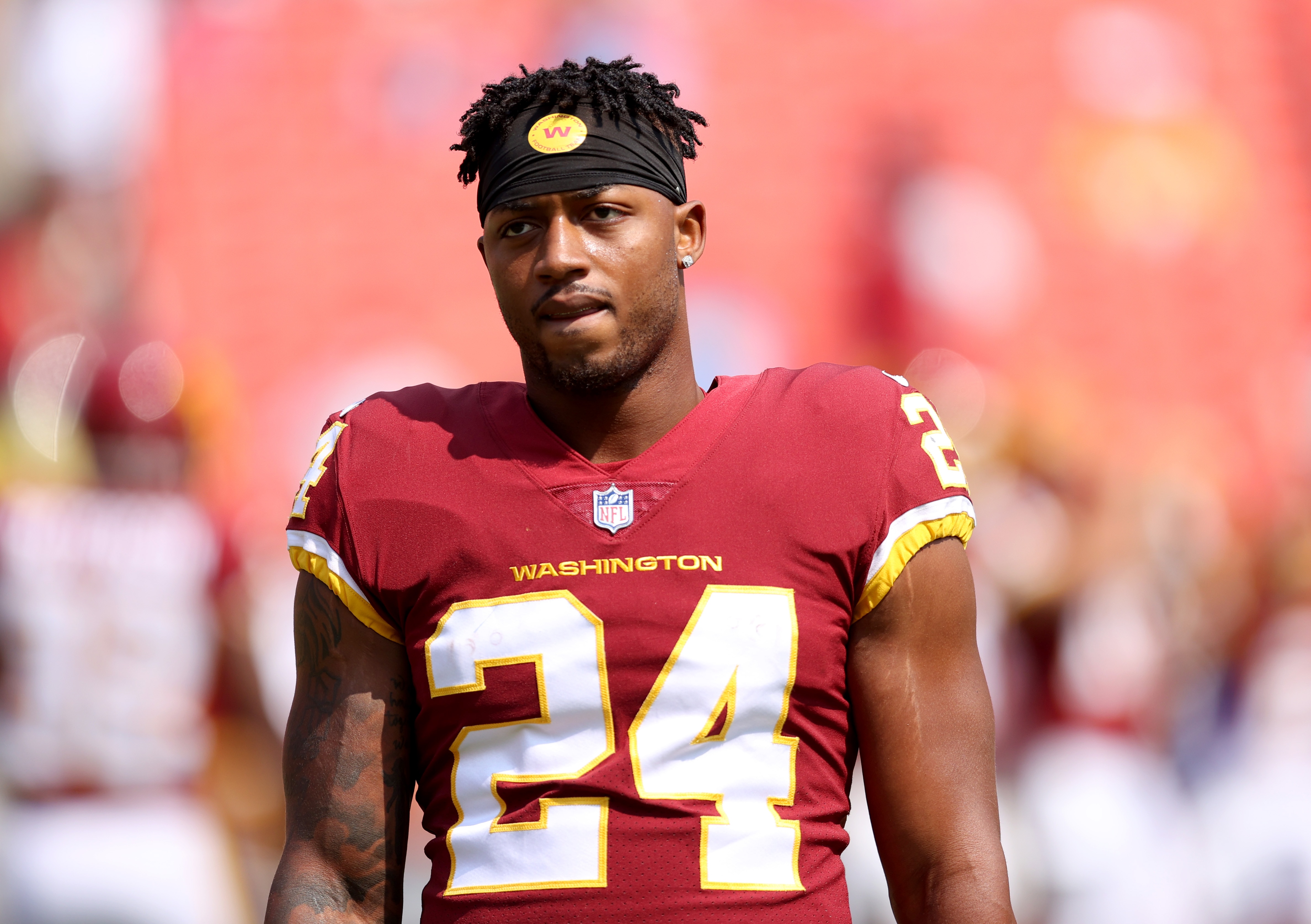 LANDOVER, MARYLAND - SEPTEMBER 12: Antonio Gibson #24 of the Washington Football Team looks on prior to the game against the Los Angeles Chargers at FedExField on September 12, 2021 in Landover, Maryland. (Photo by Patrick Smith/Getty Images)