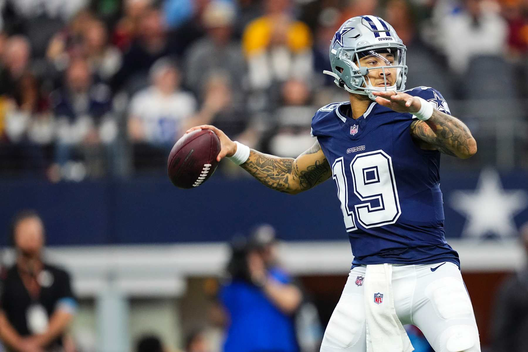 ARLINGTON, TX - JANUARY 05: Trey Lance #19 of the Dallas Cowboys throws the ball during an NFL football game against the Washington Commanders at AT&T Stadium on January 5, 2025 in Arlington, Texas. (Photo by Cooper Neill/Getty Images)