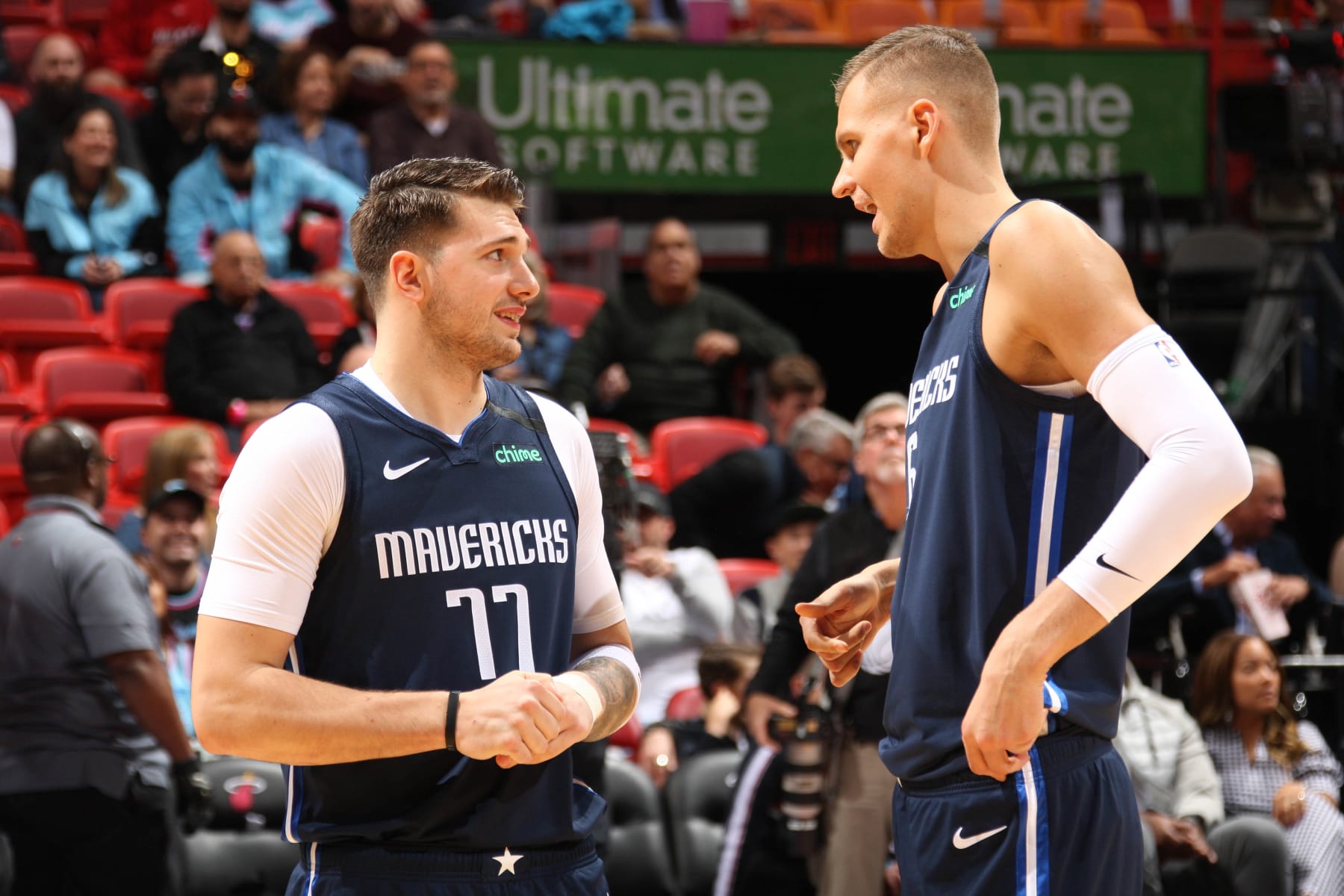 MIAMI, FL - FEBRUARY 28: Luka Doncic #77 of the Dallas Mavericks talks with Kristaps Porzingis #6 of the Dallas Mavericks before the game on February 28, 2020 at American Airlines Arena in Miami, Florida. NOTE TO USER: User expressly acknowledges and agrees that, by downloading and or using this Photograph, user is consenting to the terms and conditions of the Getty Images License Agreement. Mandatory Copyright Notice: Copyright 2020 NBAE (Photo by Oscar Baldizon/NBAE via Getty Images)