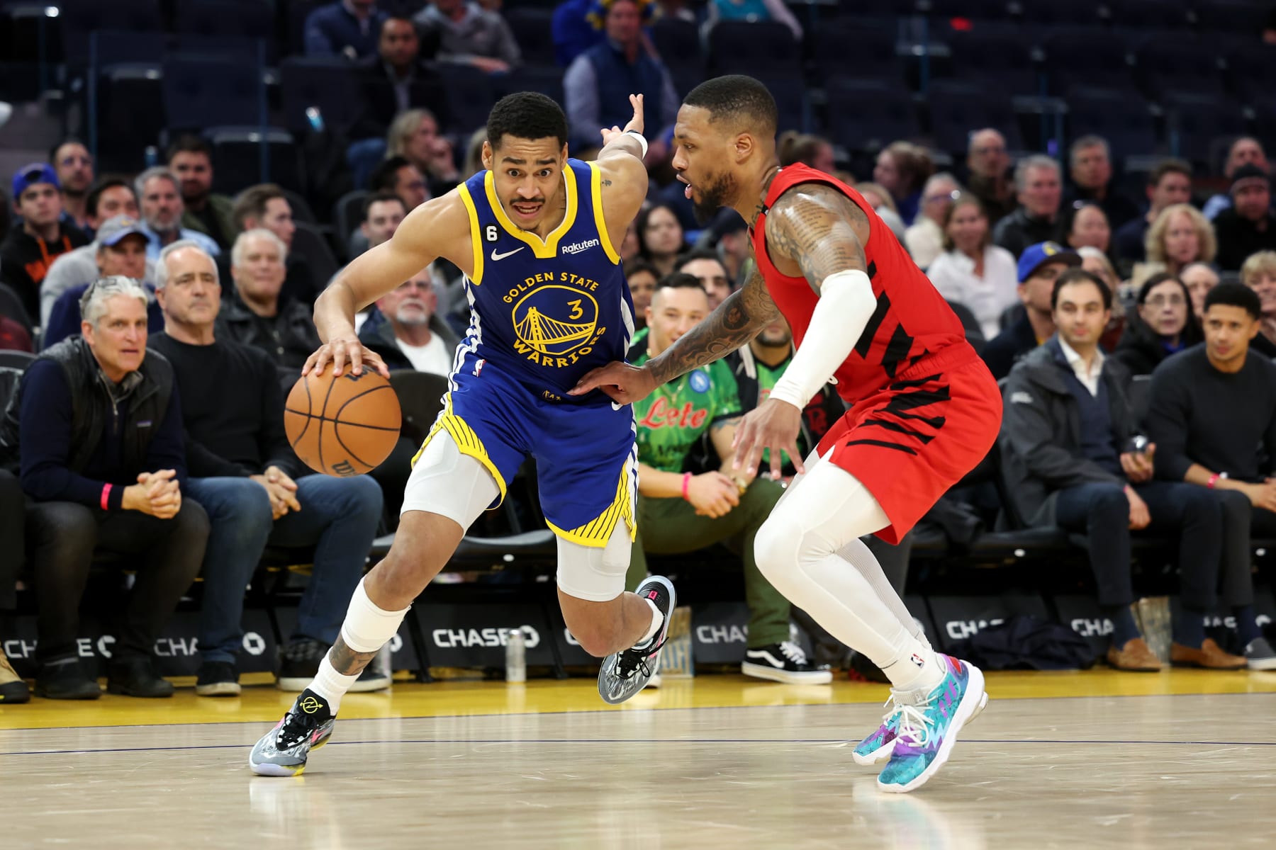 SAN FRANCISCO, CALIFORNIA - FEBRUARY 28: Jordan Poole #3 of the Golden State Warriors dribbles the ball against Damian Lillard #0 of the Portland Trail Blazers at Chase Center on February 28, 2023 in San Francisco, California.  NOTE TO USER: User expressly acknowledges and agrees that, by downloading and or using this photograph, User is consenting to the terms and conditions of the Getty Images License Agreement.  (Photo by Ezra Shaw/Getty Images)