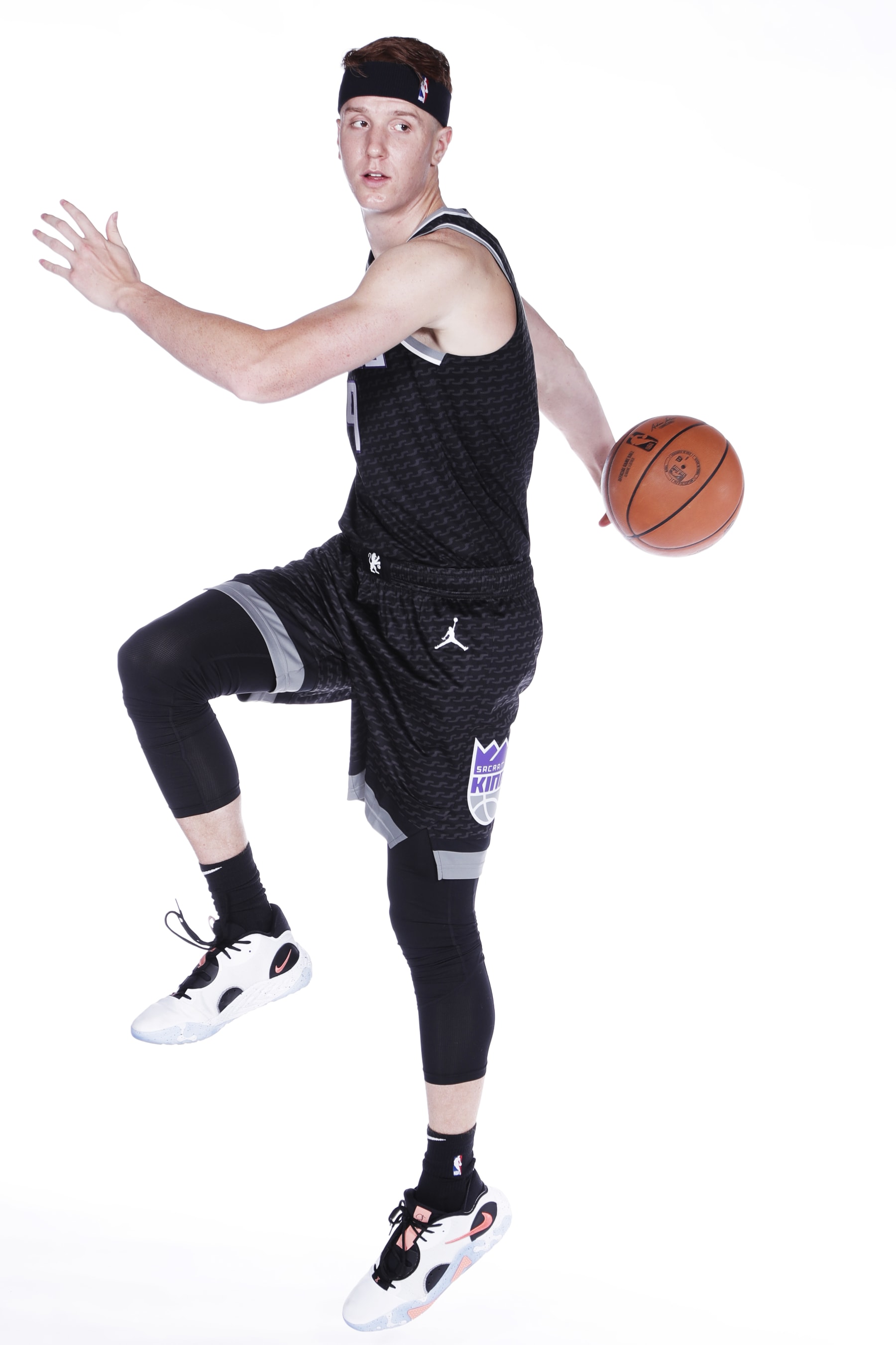 SACRAMENTO, CA - SEPTEMBER 26: Kevin Huerter #9 of the Sacramento Kings poses for a portrait during NBA Media Day on September 26, 2022 at the Golden 1 Center in Sacramento, California. NOTE TO USER: User expressly acknowledges and agrees that, by downloading and/or using this Photograph, user is consenting to the terms and conditions of the Getty Images License Agreement. Mandatory Copyright Notice: Copyright 2022 NBAE (Photo by Rocky Widner/NBAE via Getty Images)