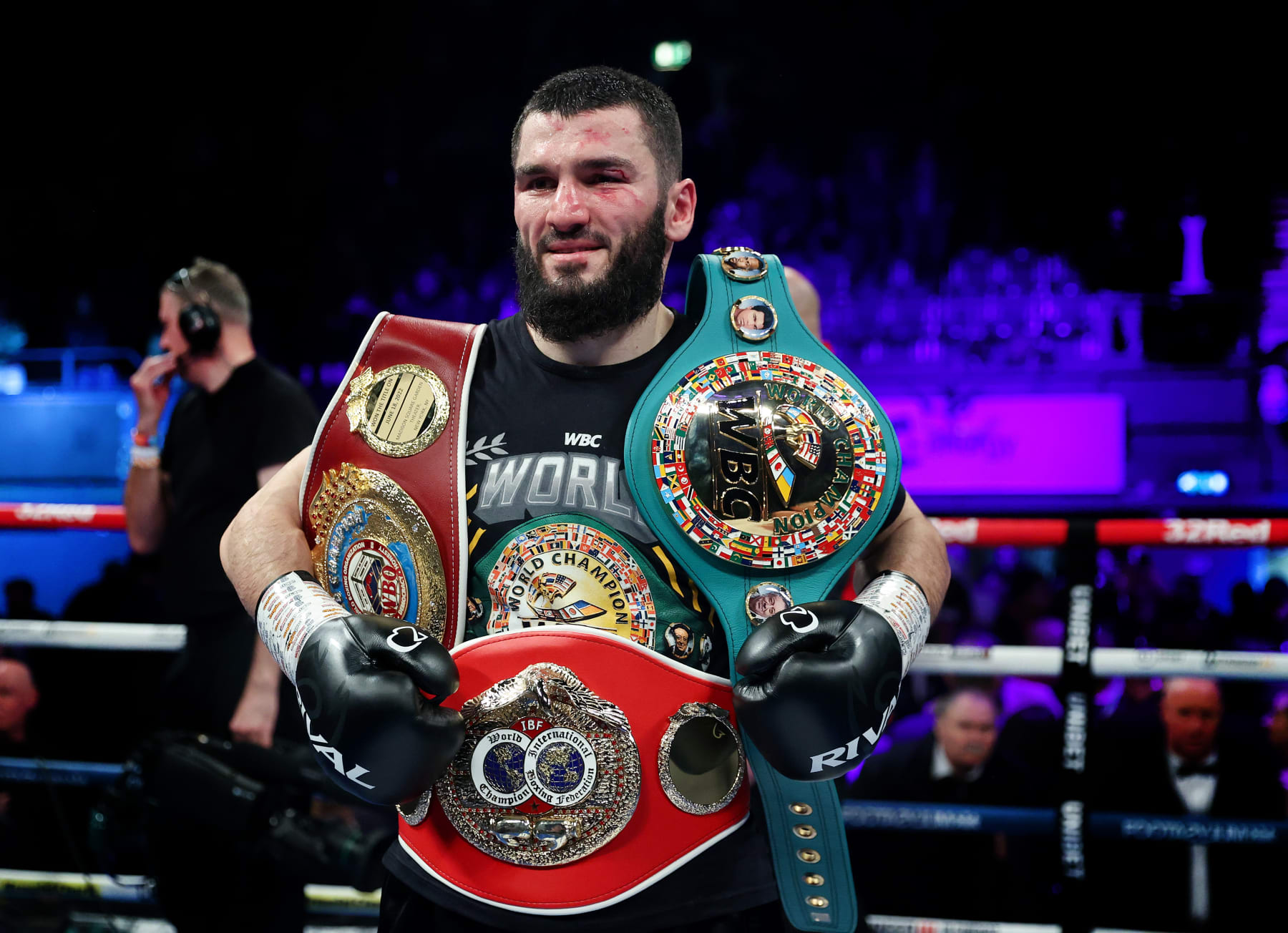 LONDON, ENGLAND - JANUARY 28: Artur Beterbiev poses for a photograph with their Title Belts after defeating Anthony Yarde ( not pictured ) during the IBF, WBC, WBO World Light Heavyweight Title fight between Artur Beterbiev and Anthony Yarde at OVO Arena Wembley on January 28, 2023 in London, England. (Photo by James Chance/Getty Images)