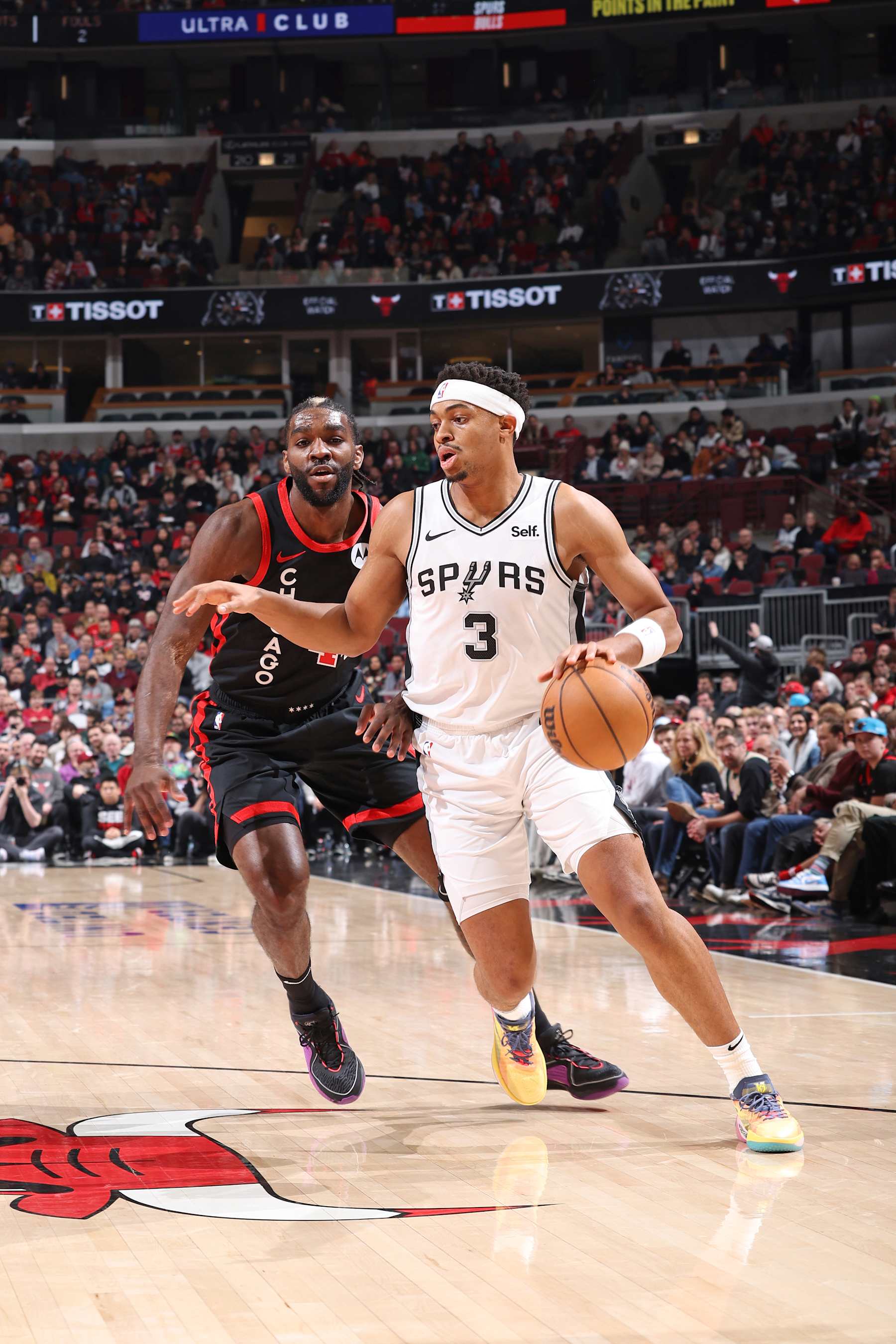 CHICAGO, IL - DECEMBER 21: Keldon Johnson #3 of the San Antonio Spurs dribbles the ball during the game against the Chicago Bulls on December 21, 2023 at United Center in Chicago, Illinois. NOTE TO USER: User expressly acknowledges and agrees that, by downloading and or using this photograph, User is consenting to the terms and conditions of the Getty Images License Agreement. Mandatory Copyright Notice: Copyright 2023 NBAE (Photo by Jeff Haynes/NBAE via Getty Images)