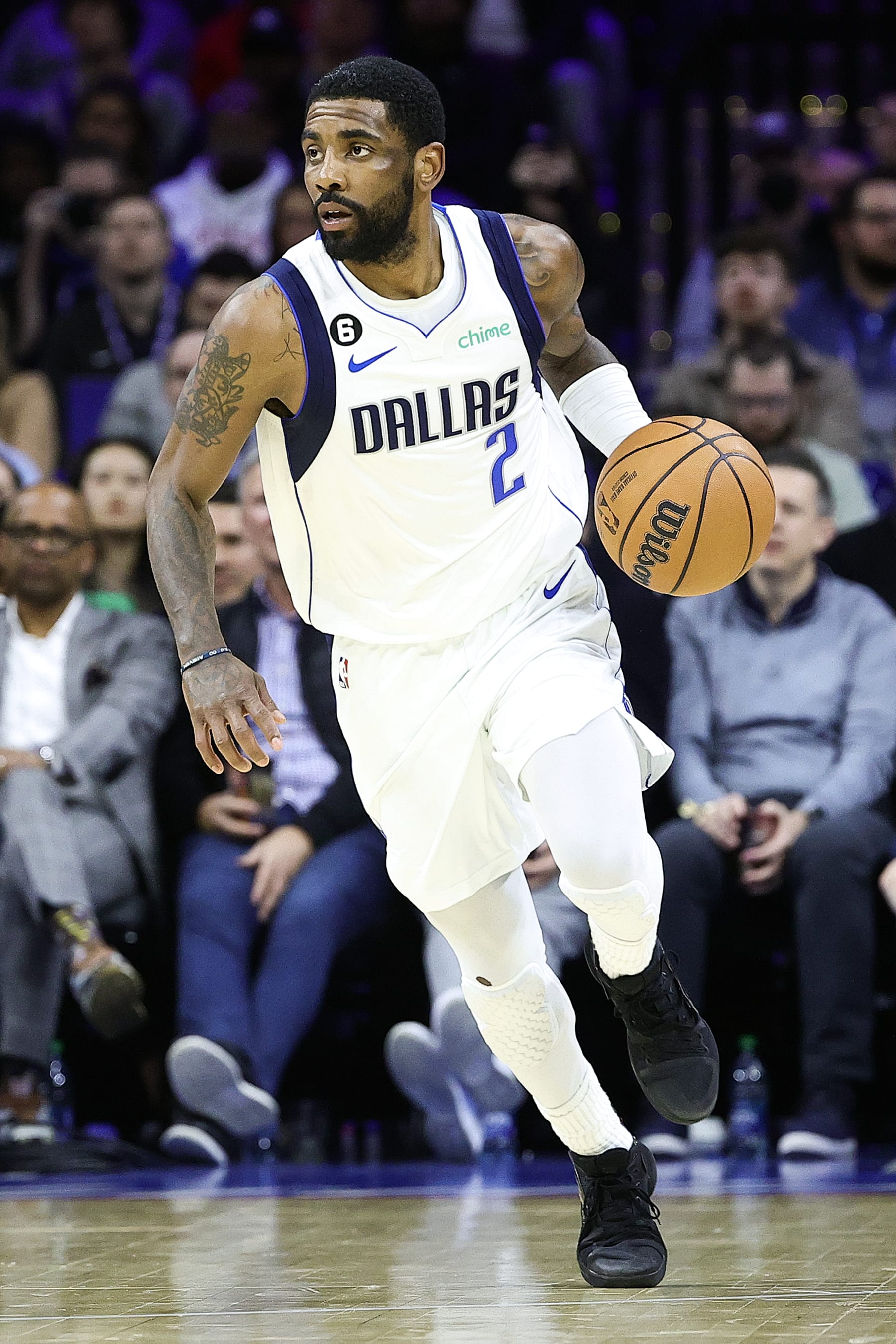 PHILADELPHIA, PENNSYLVANIA - MARCH 29: Kyrie Irving #2 of the Dallas Mavericks dribbles during the fourth quarter against the Philadelphia 76ers at Wells Fargo Center on March 29, 2023 in Philadelphia, Pennsylvania. NOTE TO USER: User expressly acknowledges and agrees that, by downloading and or using this photograph, User is consenting to the terms and conditions of the Getty Images License Agreement. (Photo by Tim Nwachukwu/Getty Images)