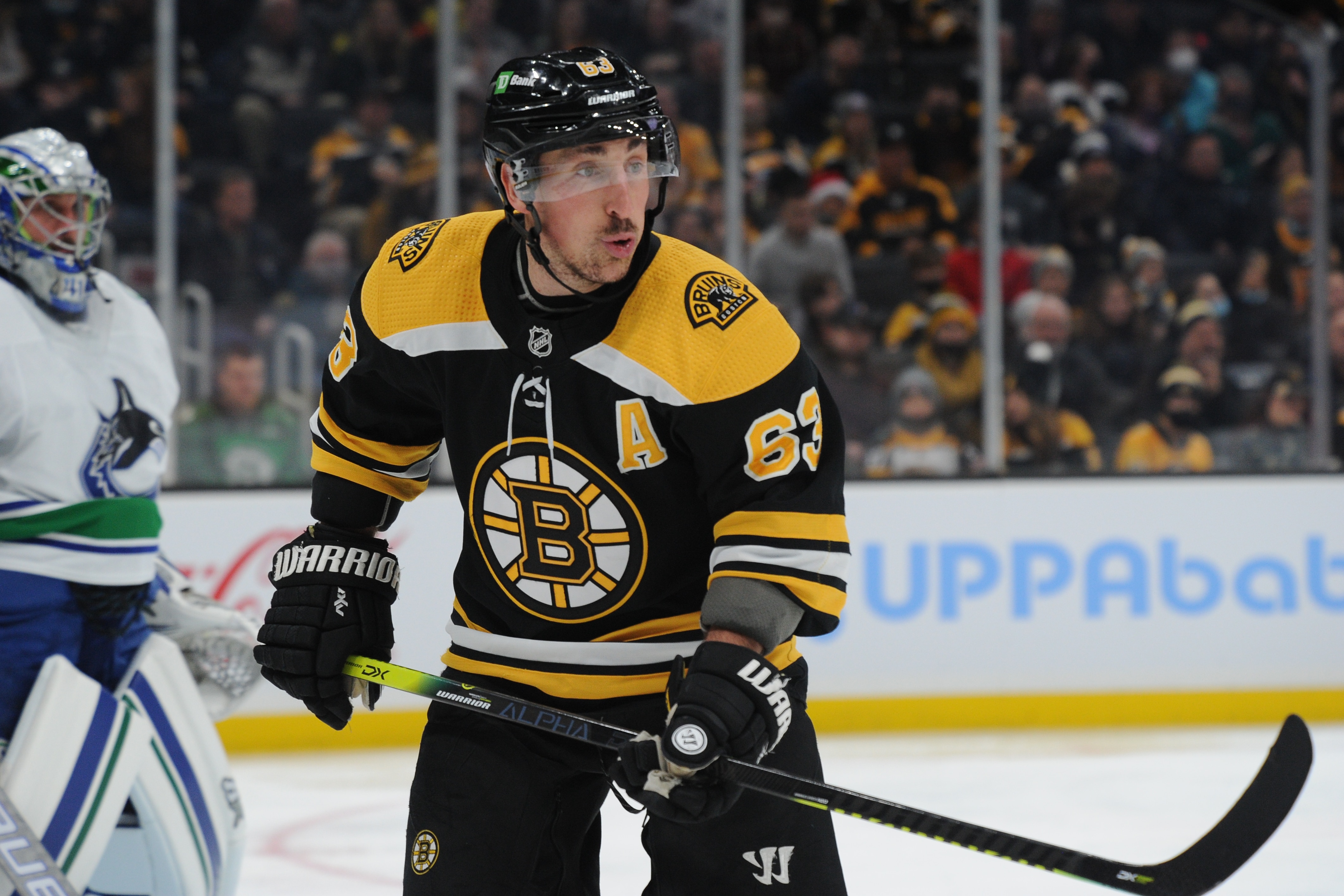 BOSTON, MA - NOVEMBER 28: Brad Marchand #63 of the Boston Bruins skates against the Vancouver Canucks at the TD Garden on November 28, 2021 in Boston, Massachusetts. (Photo by Steve Babineau/NHLI via Getty Images)