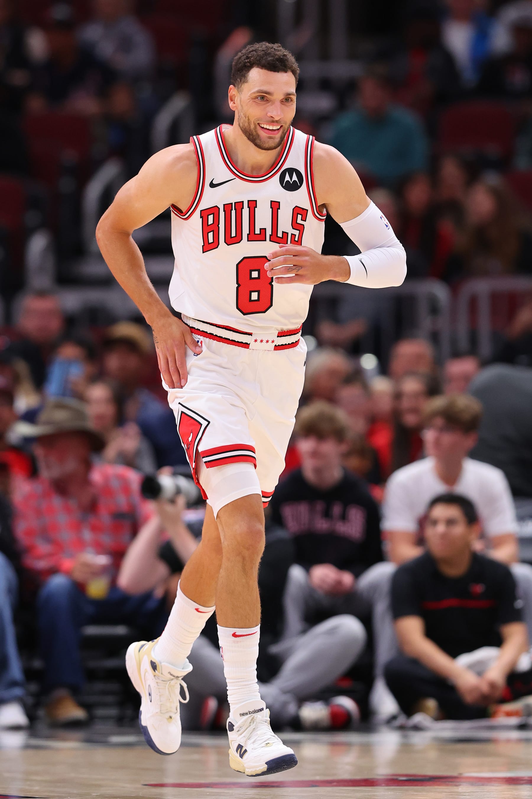 CHICAGO, ILLINOIS - OCTOBER 12: Zach LaVine #8 of the Chicago Bulls laughs against the Denver Nuggets during the first half at the United Center on October 12, 2023 in Chicago, Illinois. NOTE TO USER: User expressly acknowledges and agrees that, by downloading and or using this photograph, User is consenting to the terms and conditions of the Getty Images License Agreement.  (Photo by Michael Reaves/Getty Images)