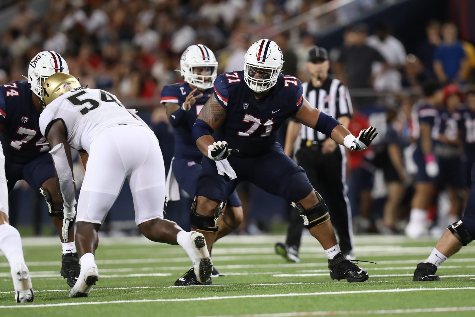 TUCSON, AZ - OCTOBER 01: Arizona Wildcats offensive lineman Jonah Savaiinaea #71 during a football game between the University of Colorado Buffaloes and the University of Arizona Wildcats on October 1, 2022 at Arizona Stadium in Tucson, AZ.  (Photo by Christopher Hook/Icon Sportswire via Getty Images)