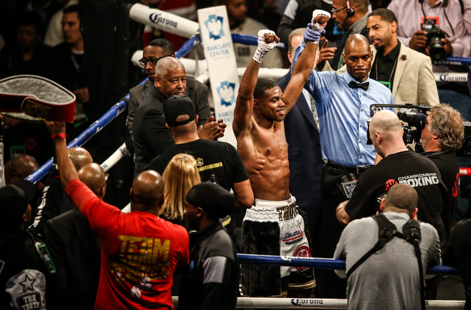 NEW YORK, NY - JANUARY 20:  Errol Spence (white trunks) celebrates the win against Lamont Peterson (purple trunks) on January 20, 2018 at the Barclays Center in Brooklyn neighborhood of New York City. Spence won in the 8th round by technical knockout.  (Photo by Anthony Geathers/Getty Images)
