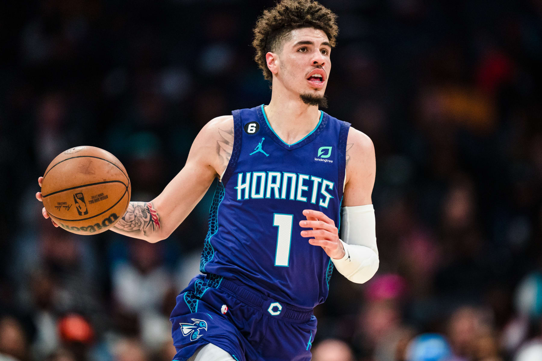 CHARLOTTE, NORTH CAROLINA - FEBRUARY 25: LaMelo Ball #1 of the Charlotte Hornets brings the ball up court against the Miami Heat during their game at Spectrum Center on February 25, 2023 in Charlotte, North Carolina. NOTE TO USER: User expressly acknowledges and agrees that, by downloading and or using this photograph, User is consenting to the terms and conditions of the Getty Images License Agreement. (Photo by Jacob Kupferman/Getty Images)
