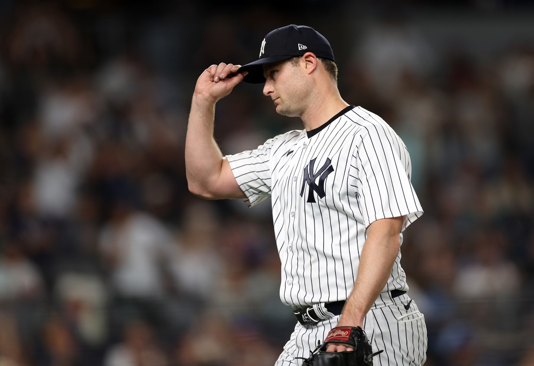 NEW YORK, NEW YORK - JUNE 20:  Starting pitcher Gerrit Cole #45 of the New York Yankees tips his hat to a standing ovation by the crowd after leaving the game in the 8th inning against the Seattle Mariners at Yankee Stadium on June 17, 2023 in New York City. (Photo by Jamie Squire/Getty Images)