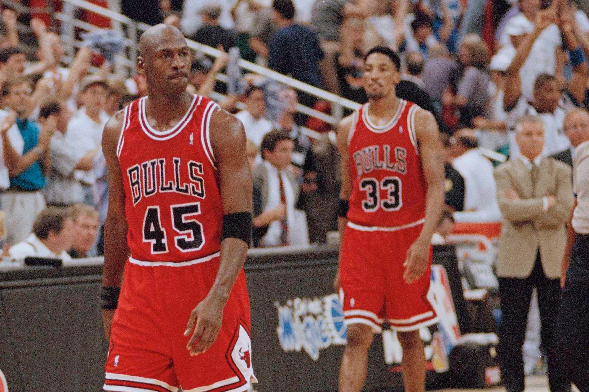 FILE - In this May 7, 1995, file photo, Chicago Bulls guard Michael Jordan (45) and forward Scottie Pippen (33) walk back to the bench during a timeout in the closing seconds of an NBA basketball playoff game in Orlando. Pippen says he’s talked with Jordan since “The Last Dance” documentary aired in the spring and downplayed any rift between the retired Bulls stars. (AP Photo/Robert Baker, File)