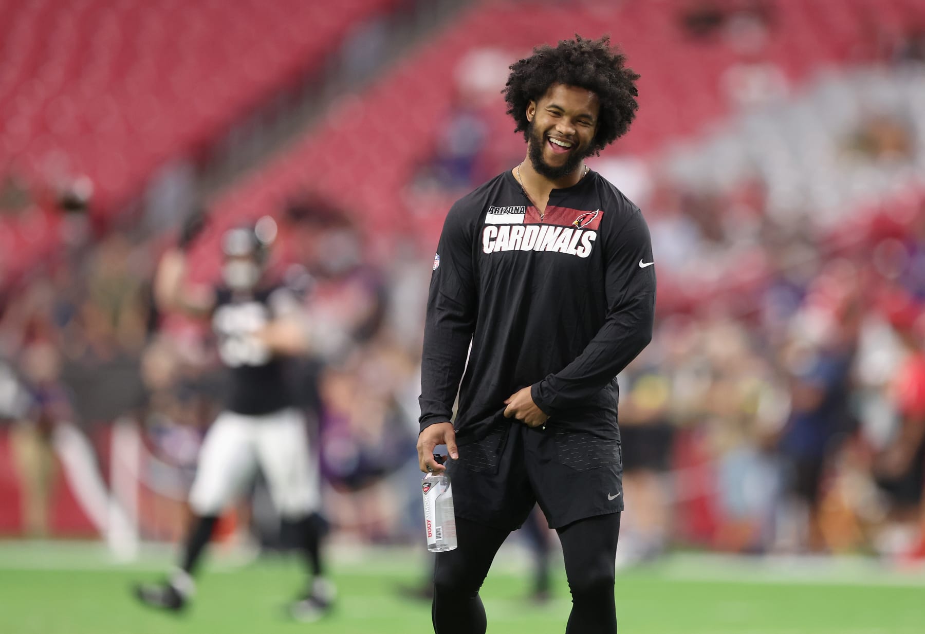 GLENDALE, ARIZONA - AUGUST 21: Quarterback Kyler Murray #1 of the Arizona Cardinals walks on the field before the NFL preseason game against the Baltimore Ravens at State Farm Stadium on August 21, 2022 in Glendale, Arizona. The Ravens defeated the Cardinals 24-17. (Photo by Christian Petersen/Getty Images)