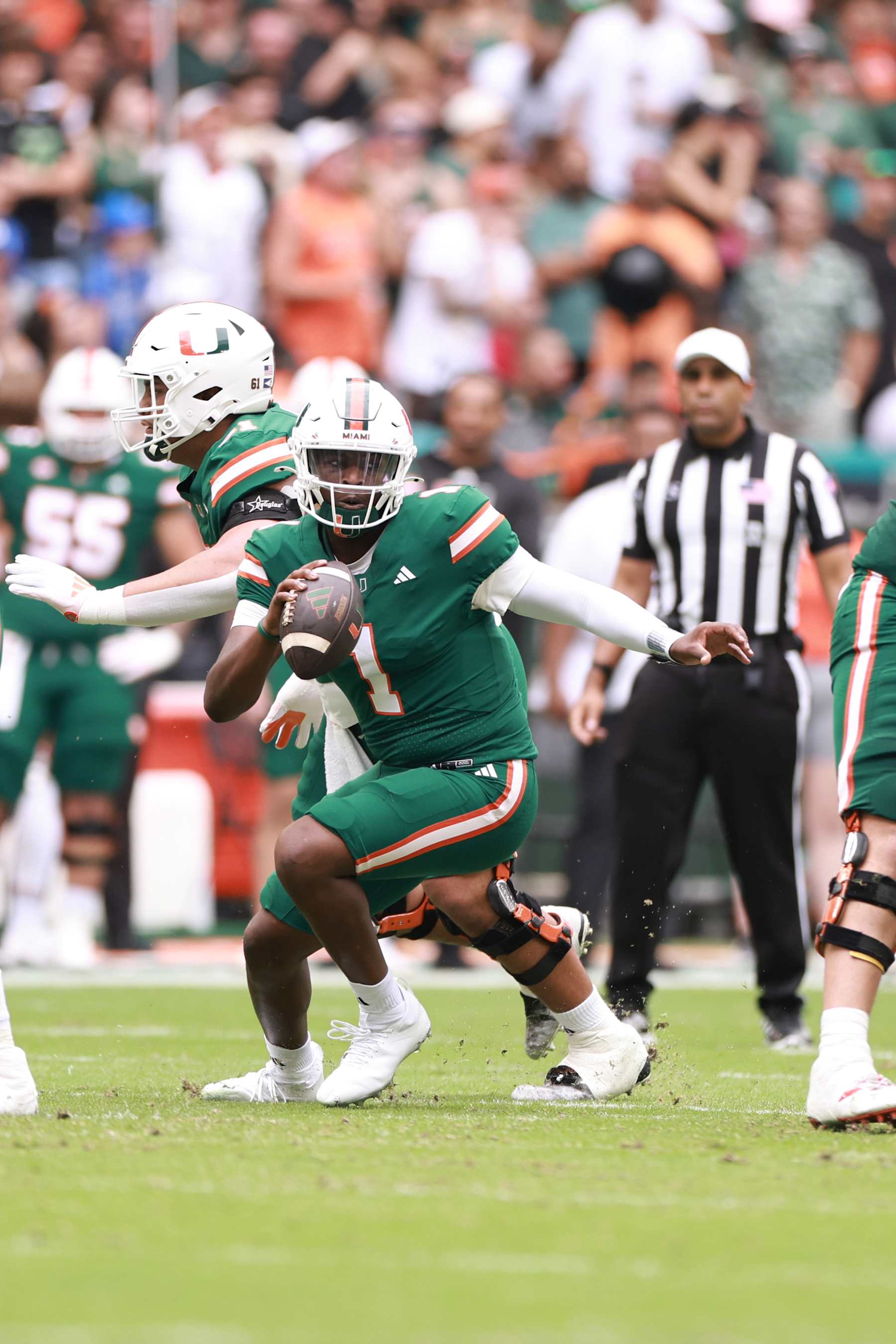 MIAMI GARDENS, FLORIDA - NOVEMBER 02: Cam Ward #1 of the Miami Hurricanes scrambles against the Duke Blue Devils during the first half at Hard Rock Stadium on November 02, 2024 in Miami Gardens, Florida. (Photo by Carmen Mandato/Getty Images)
