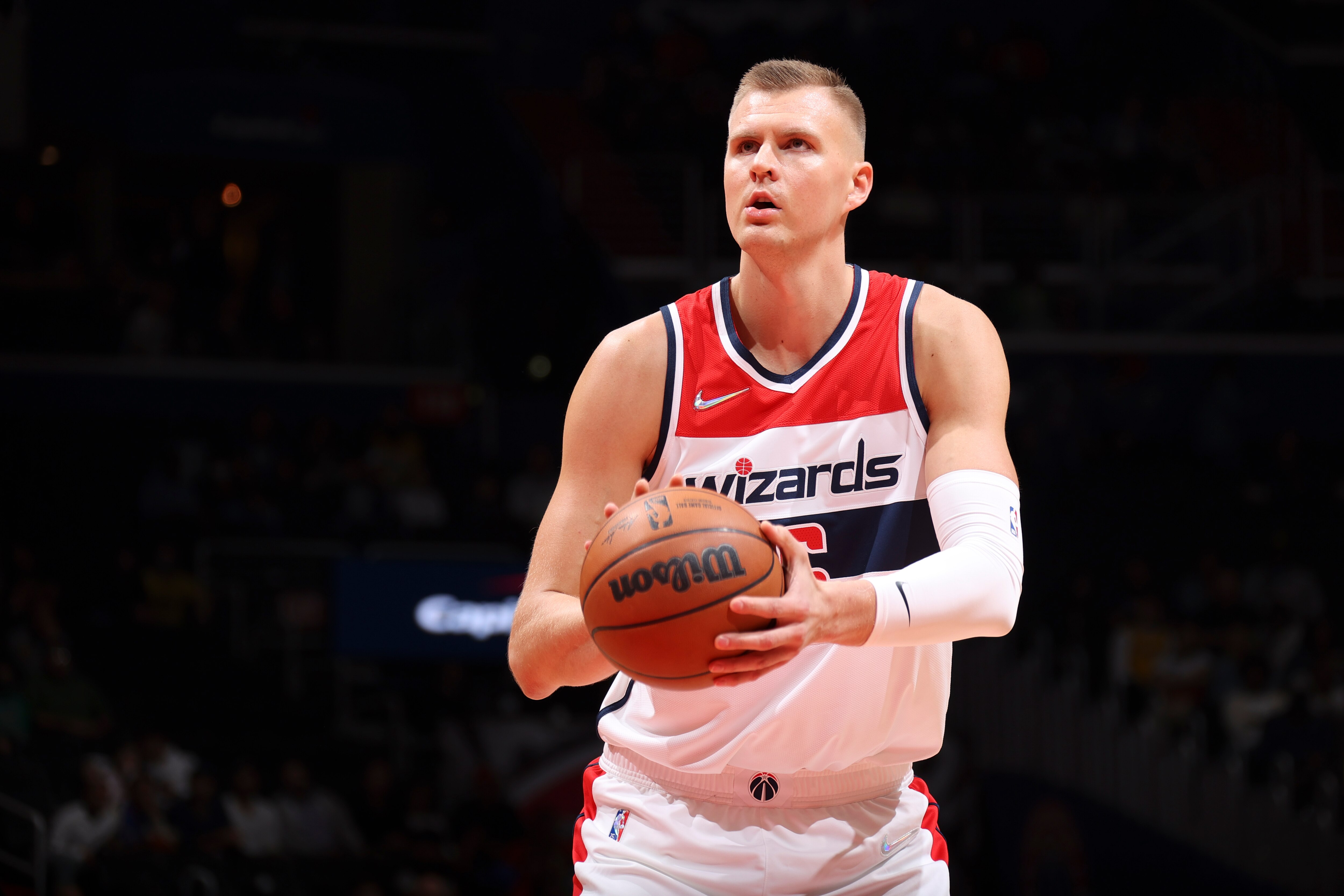 WASHINGTON, DC -  MARCH 06: Kristaps Porzingis #6 of the Washington Wizards shoots a free throw during the game against the Indiana Pacers on March 06, 2022 at Capital One Arena in Washington, DC. NOTE TO USER: User expressly acknowledges and agrees that, by downloading and or using this Photograph, user is consenting to the terms and conditions of the Getty Images License Agreement. Mandatory Copyright Notice: Copyright 2022 NBAE (Photo by Stephen Gosling/NBAE via Getty Images)