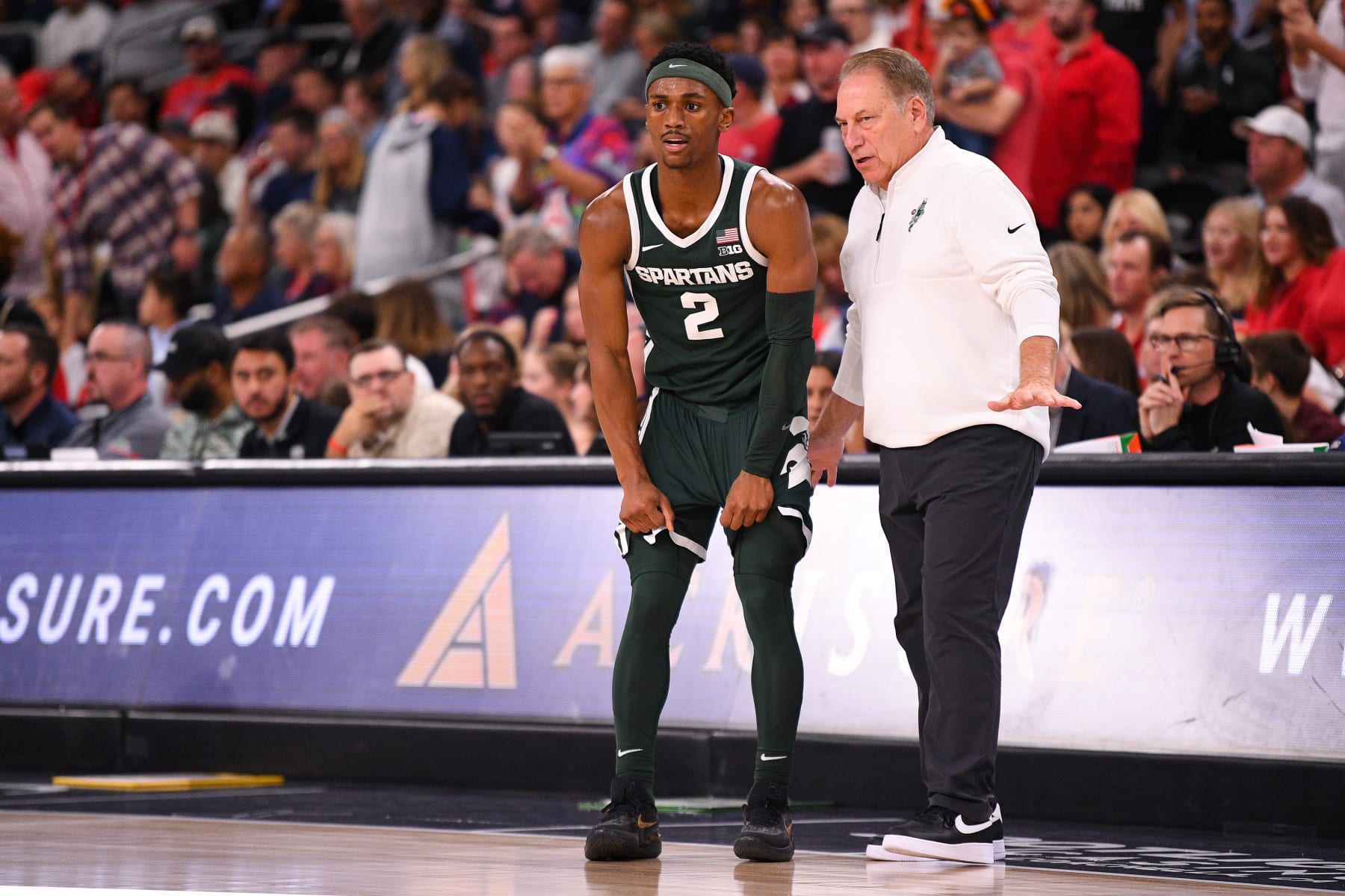 Michigan State's Tyson Walker and Tom Izzo
