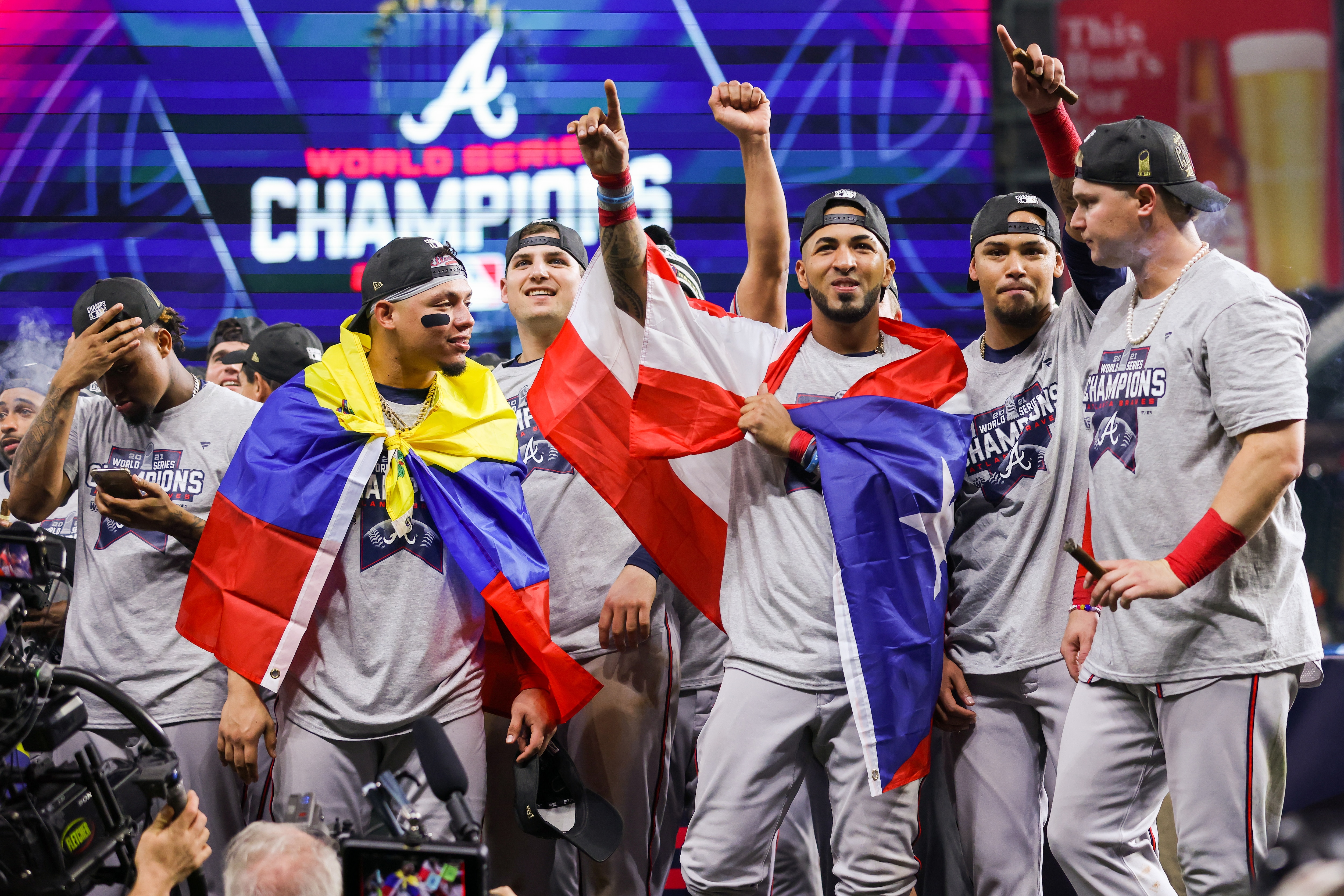 HOUSTON, TX - NOVEMBER 02: Eddie Rosario #8, William Contreras #24, Orlando Arcia #9 and Joc Pederson #22 of the Atlanta Braves celebrate after their teams 7-0 victory in Game 6 against the Houston Astros to win the 2021 World Series at Minute Maid Park on Tuesday, November 2, 2021 in Houston, Texas. (Photo by Rob Tringali/MLB Photos via Getty Images)