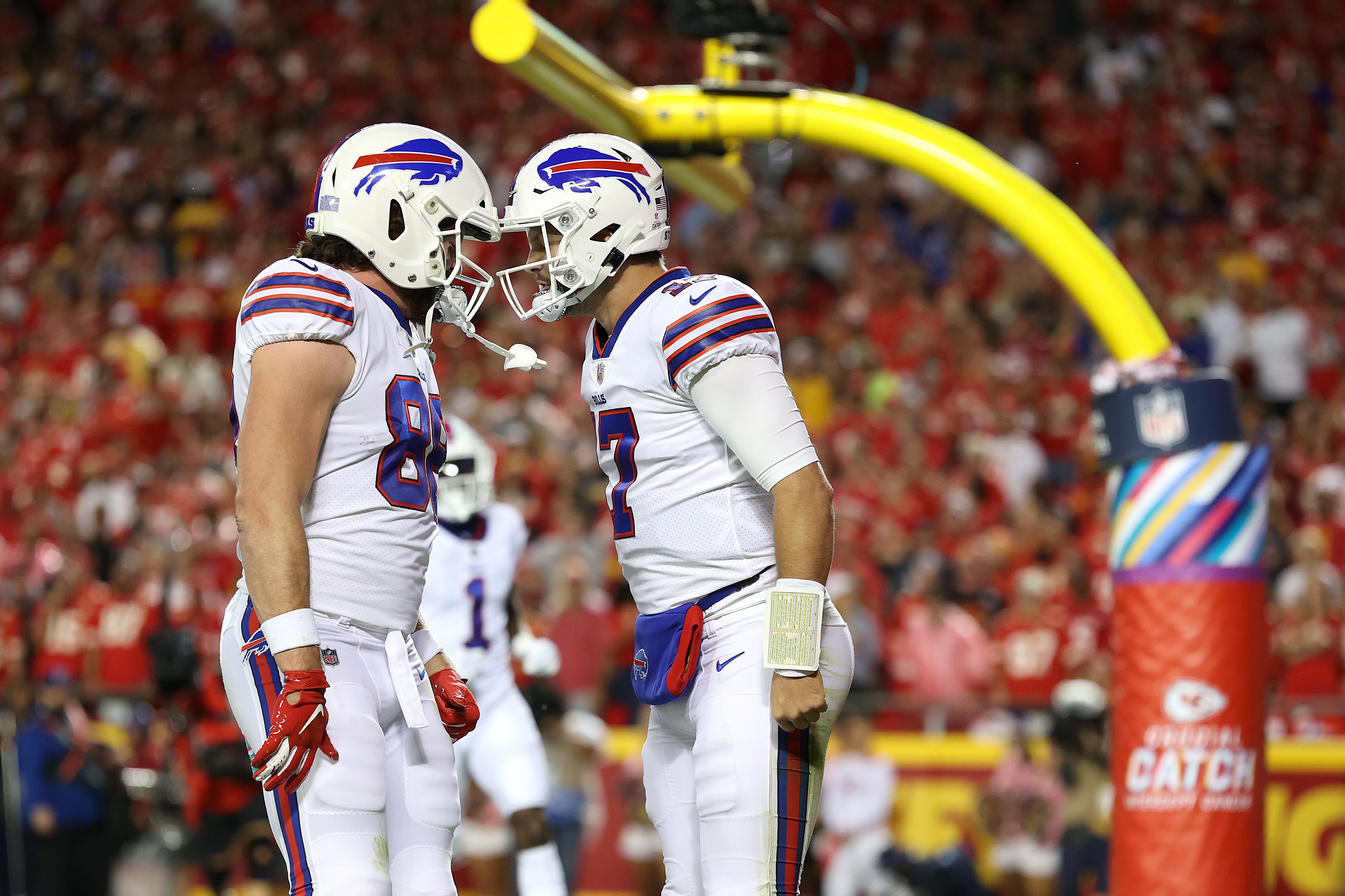 KANSAS CITY, MISSOURI - OCTOBER 10:  Dawson Knox #88 of the Buffalo Bills congrautlates Josh Allen #17 of the Buffalo Bills after a touchdown during the first half of a game against the Kansas City Chiefs at Arrowhead Stadium on October 10, 2021 in Kansas City, Missouri. (Photo by Jamie Squire/Getty Images)