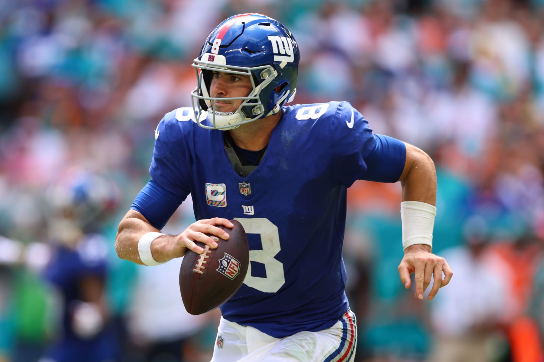 MIAMI GARDENS, FLORIDA - OCTOBER 08: Daniel Jones #8 of the New York Giants looks to pass during the first half against the Miami Dolphins at Hard Rock Stadium on October 08, 2023 in Miami Gardens, Florida. (Photo by Megan Briggs/Getty Images)