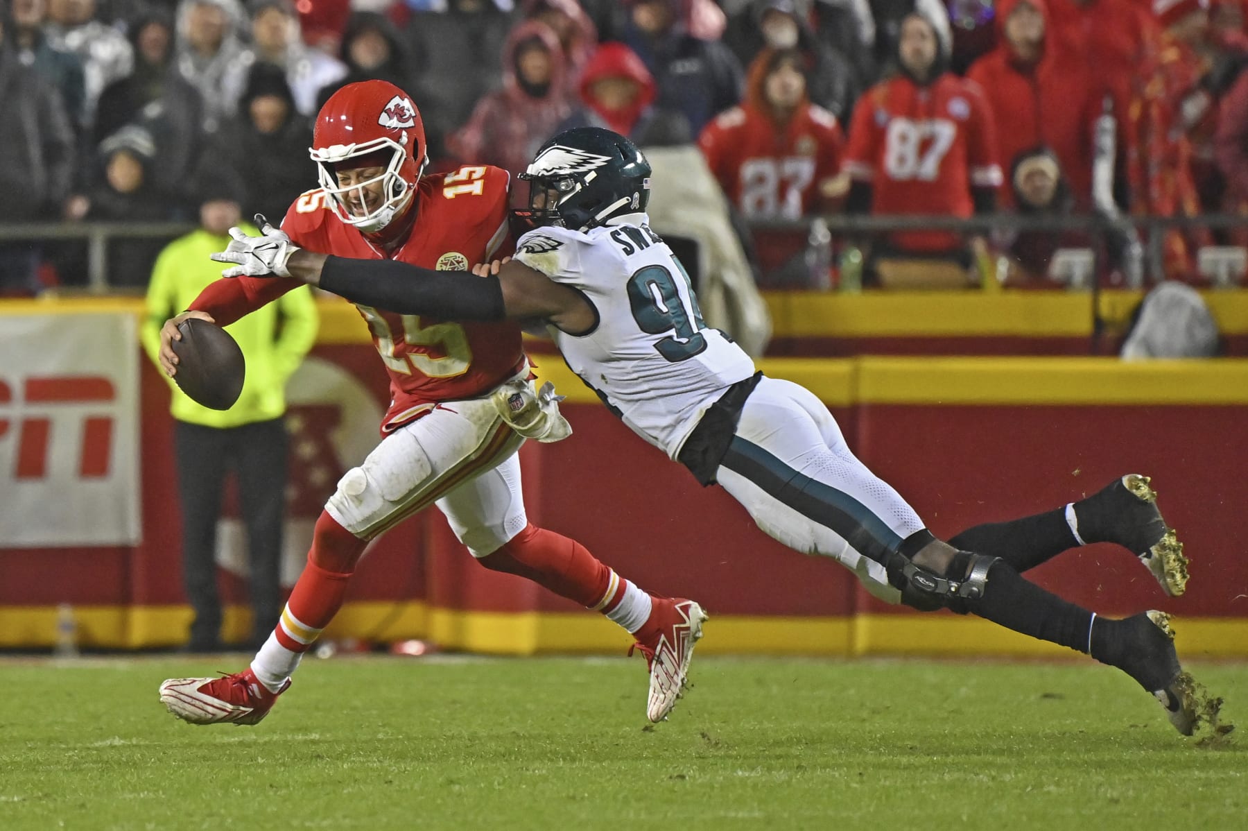 Philadelphia Eagles defensive end Josh Sweat (94) tackles Kansas City Chiefs quarterback Patrick Mahomes (15) during the second half of an NFL football game Monday, Nov. 20, 2023, in Kansas City, Mo. (AP Photo/Peter Aiken)