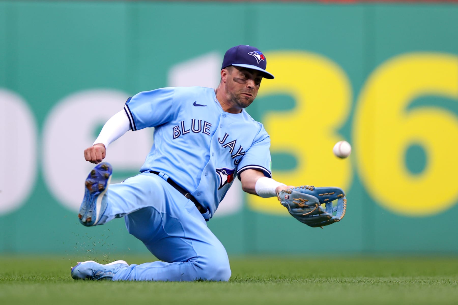 CLEVELAND, OH - AUGUST 09: Toronto Blue Jays left fielder Whit Merrifield (15) makes a sliding catch during the third inning of the Major League Baseball game between the Toronto Blue Jays and Cleveland Guardians on August 9, 2023, at Progressive Field in Cleveland, OH. (Photo by Frank Jansky/Icon Sportswire via Getty Images)