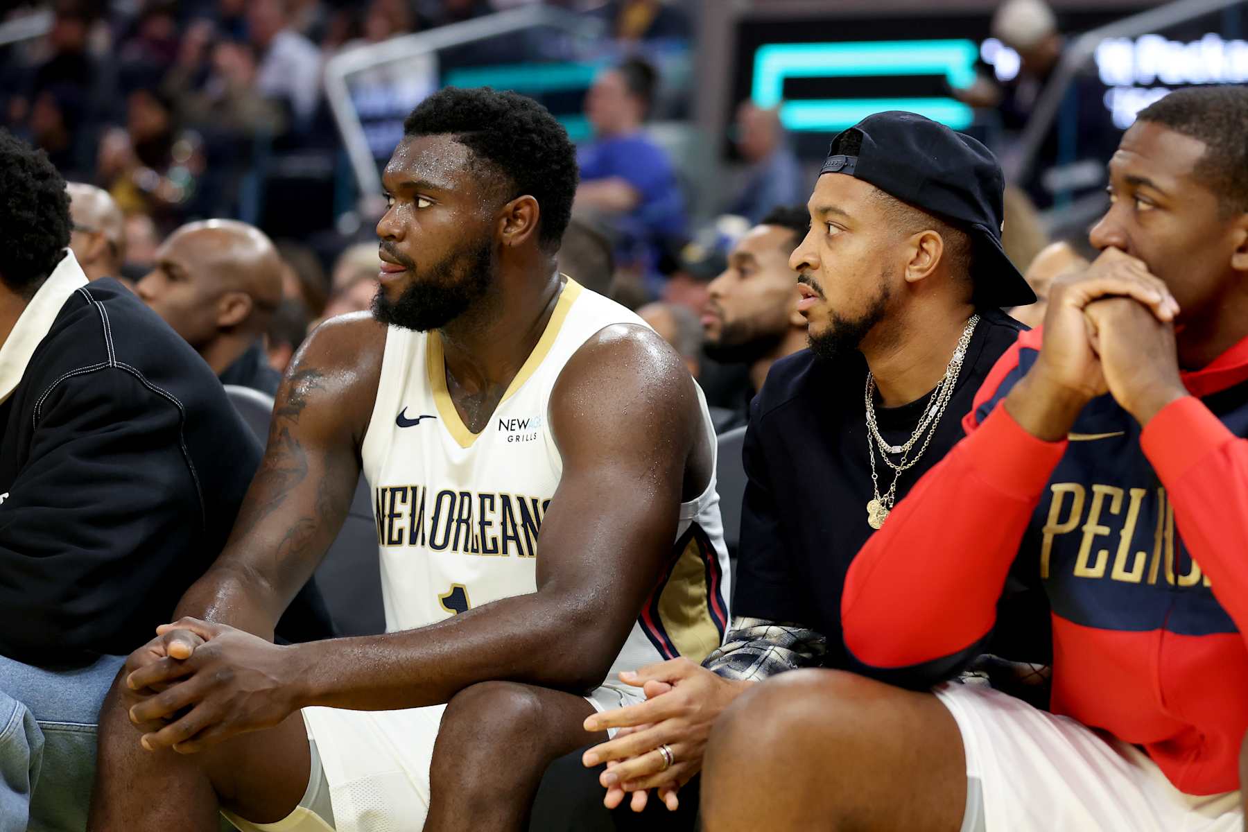 SAN FRANCISCO, CALIFORNIA - OCTOBER 30: Zion Williamson #1 sits next to CJ McCollum on the bench during their game against the Golden State Warriors in the second half at Chase Center on October 30, 2024 in San Francisco, California. NOTE TO USER: User expressly acknowledges and agrees that, by downloading and/or using this photograph, user is consenting to the terms and conditions of the Getty Images License Agreement.  (Photo by Ezra Shaw/Getty Images)