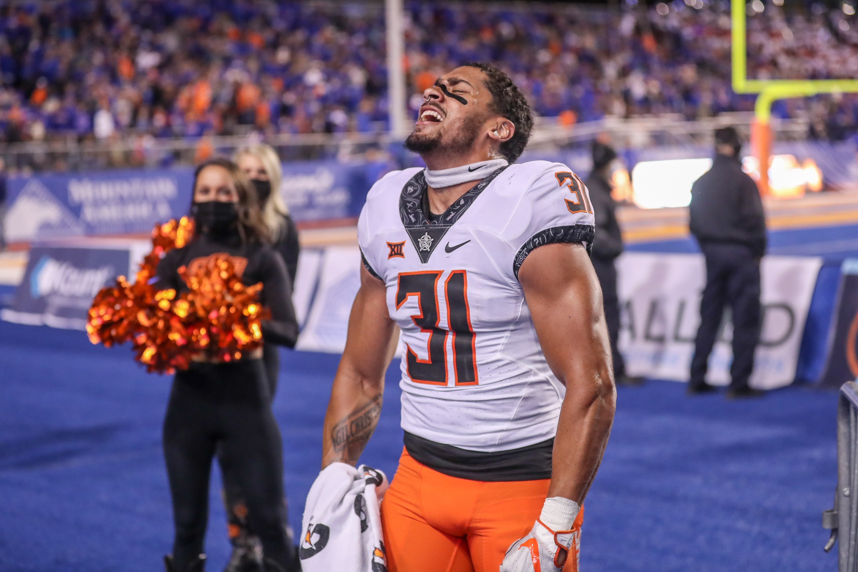 BOISE, ID - SEPTEMBER 18: Safety Kolby Harvell-Peel #31 of the Oklahoma State Cowboys celebrates the win at the conclusion of second half action against the Boise State Broncos on September 18, 2021 at Albertsons Stadium in Boise, Idaho. Oklahoma State won the game 21-20. (Photo by Loren Orr/Getty Images)