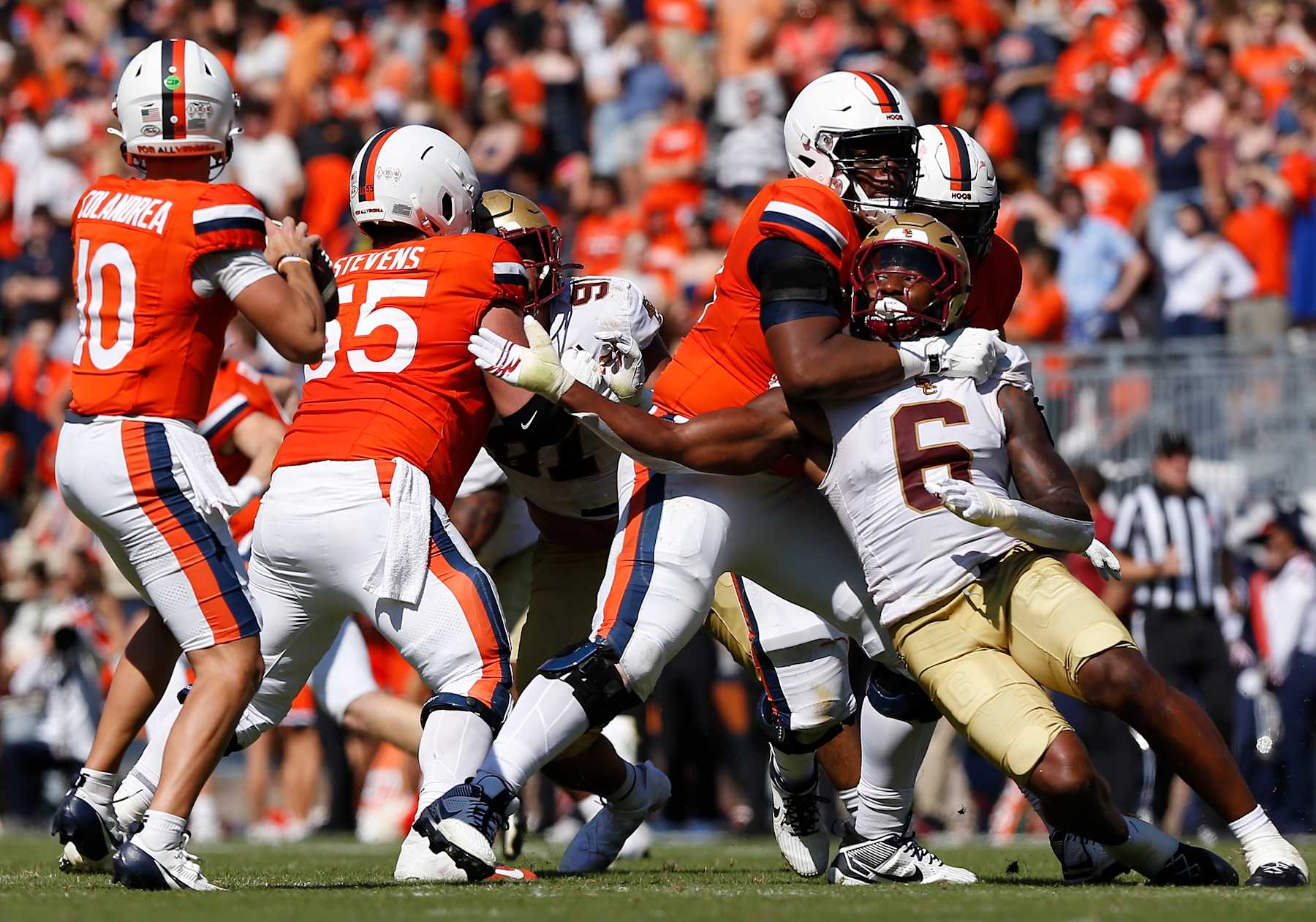 CHARLOTTESVILLE, VA - OCTOBER 05: Boston College Eagles defensive lineman Donovan Ezeiruaku (6) pressures Virginia Cavaliers quarterback Anthony Colandrea (10) in the pocket during a college football game between the Boston College Eagles and the Virginia Cavaliers on October 5, 2024, at Scott Stadium in Charlottesville, VA. (Photo by Lee Coleman/Icon Sportswire via Getty Images)