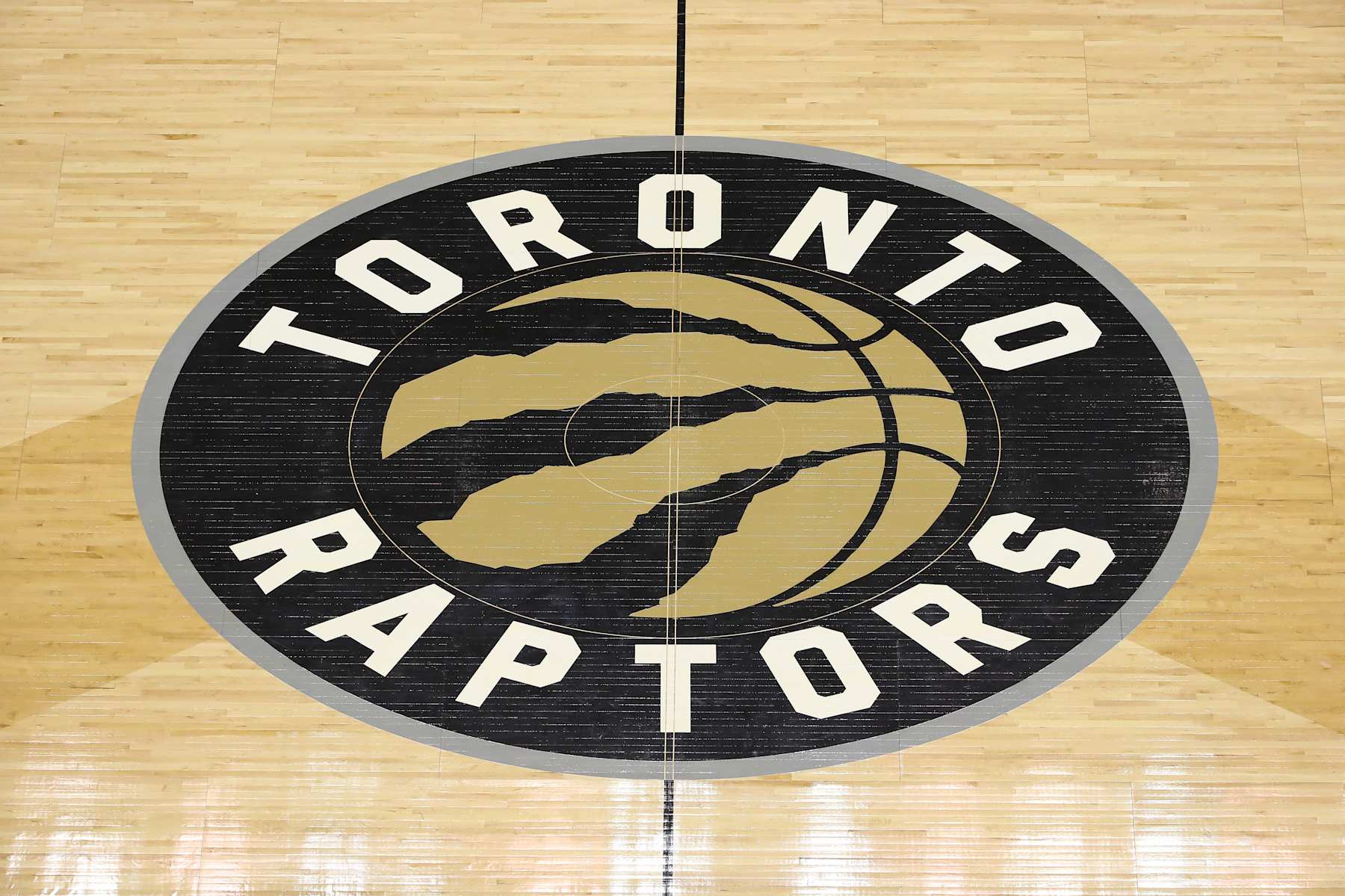 TORONTO, ON - JANUARY 26: The team logo decal at center court on Welcome Toronto night during the Toronto Raptors NBA game against the Utah Jazz at Air Canada Centre on January 26, 2018 in Toronto, Canada. NOTE TO USER: User expressly acknowledges and agrees that, by downloading and or using this photograph, User is consenting to the terms and conditions of the Getty Images License Agreement. (Photo by Tom Szczerbowski/Getty Images) *** Local Caption ***