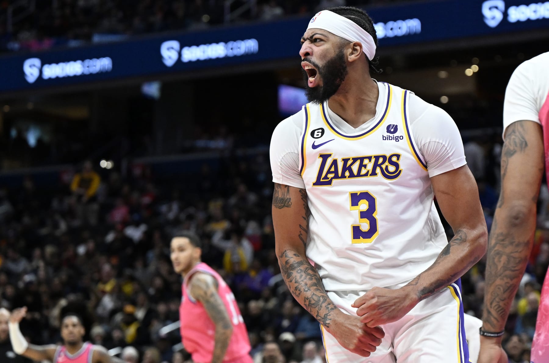 WASHINGTON, DC - DECEMBER 04: Anthony Davis #3 of the Los Angeles Lakers celebrates during the third quarter of the game against the Washington Wizards at Capital One Arena on December 04, 2022 in Washington, DC. NOTE TO USER: User expressly acknowledges and agrees that, by downloading and or using this photograph, User is consenting to the terms and conditions of the Getty Images License Agreement.  (Photo by Greg Fiume/Getty Images)