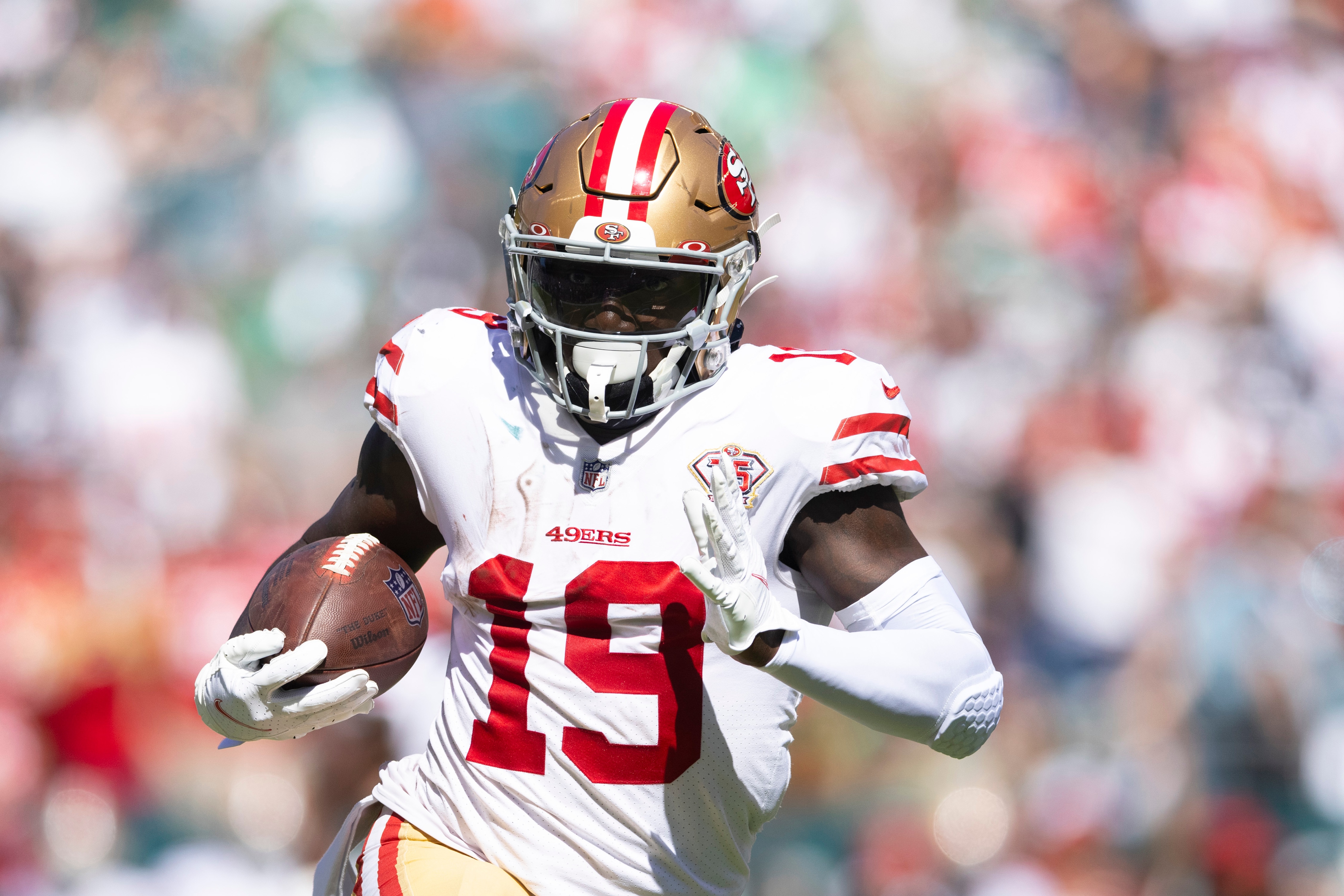 PHILADELPHIA, PA - SEPTEMBER 19: Deebo Samuel #19 of the San Francisco 49ers runs with the ball against the Philadelphia Eagles at Lincoln Financial Field on September 19, 2021 in Philadelphia, Pennsylvania. (Photo by Mitchell Leff/Getty Images)