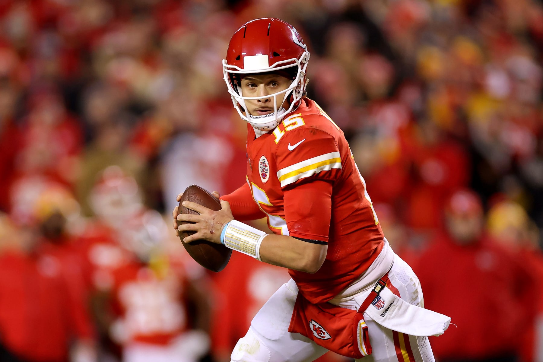KANSAS CITY, MISSOURI - JANUARY 23: Patrick Mahomes #15 of the Kansas City Chiefs looks to pass against the Buffalo Bills during the second quarter in the AFC Divisional Playoff game at Arrowhead Stadium on January 23, 2022 in Kansas City, Missouri. (Photo by David Eulitt/Getty Images)