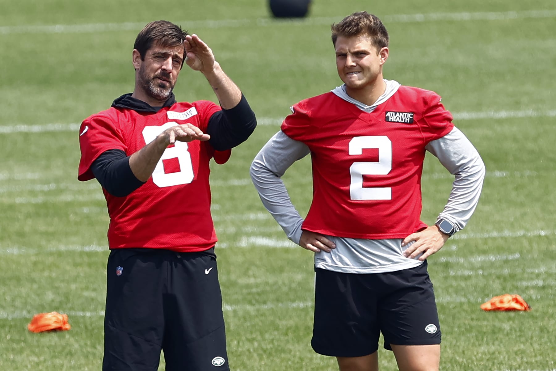 FLORHAM PARK, NEW JERSEY - JUNE 6: Quarterbacks Aaron Rodgers #8 and Zach Wilson #2 of the New York Jets talk during the team's OTA's at Atlantic Health Jets Training Center on June 6, 2023 in Florham Park, New Jersey. (Photo by Rich Schultz/Getty Images)