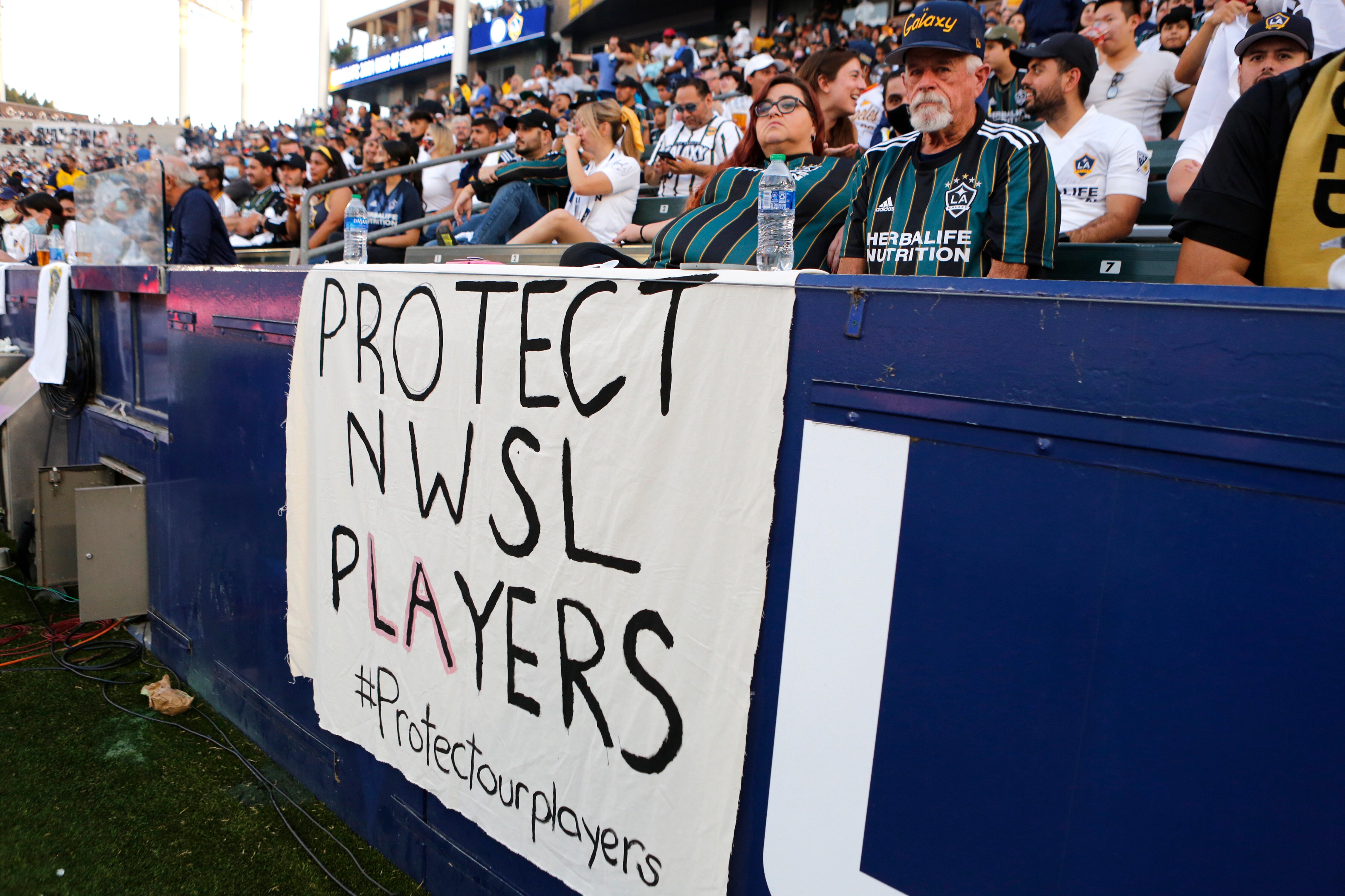 CARSON, CALIFORNIA - OCTOBER 03: Signage supporting NWSL players is seen during a game between the Los Angeles Galaxy and the Los Angeles FC at Dignity Health Sports Park on October 03, 2021 in Carson, California. (Photo by Katharine Lotze/Getty Images)