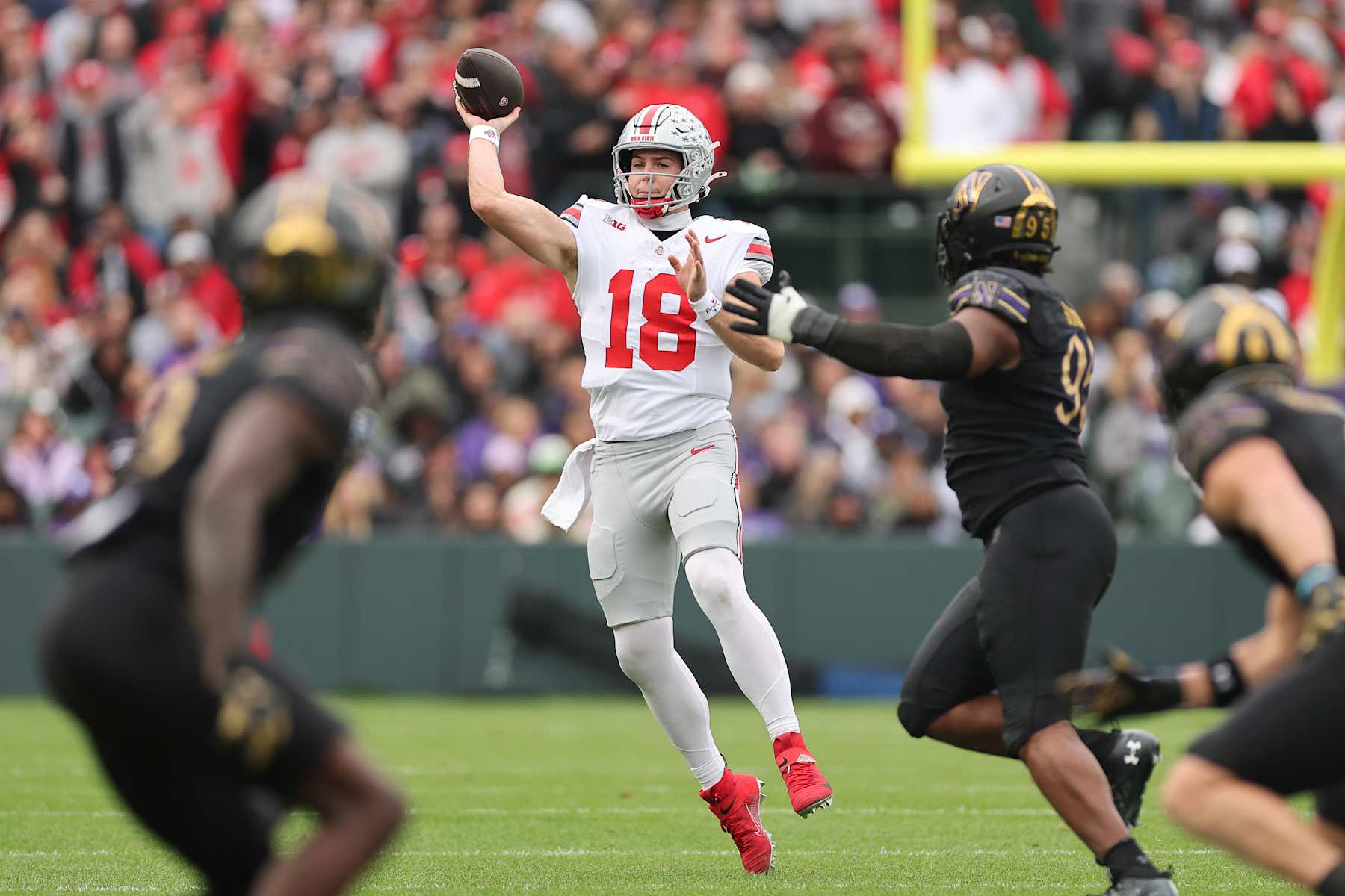 CHICAGO, ILLINOIS - NOVEMBER 16: Will Howard #18 of the Ohio State Buckeyes throws a pass against the Northwestern Wildcats during the first half at Wrigley Field on November 16, 2024 in Chicago, Illinois. (Photo by Michael Reaves/Getty Images)