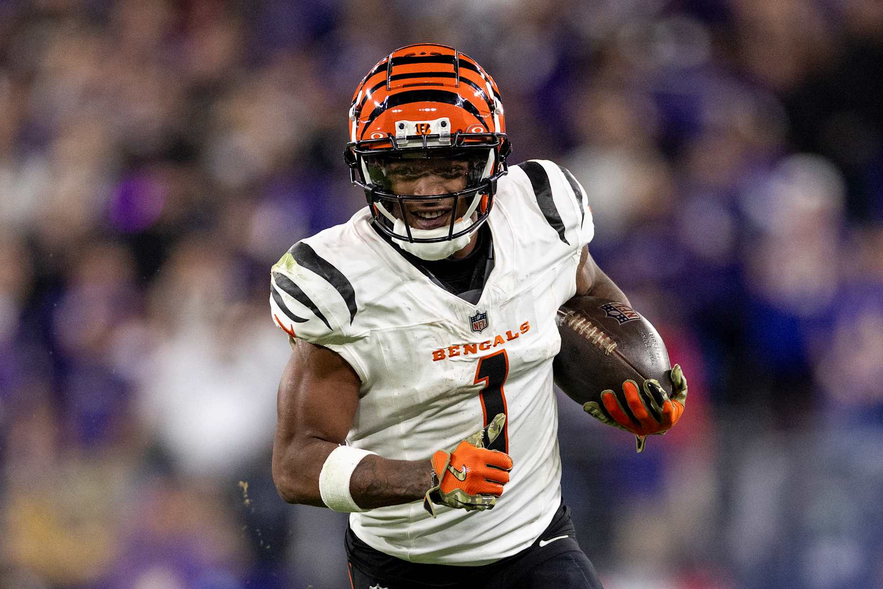 BALTIMORE, MARYLAND - NOVEMBER 7: Ja'Marr Chase #1 of the Cincinnati Bengals runs with the ball during an NFL Football game against the Cincinnati Bengals at M&T Bank Stadium on November 07, 2024 in Baltimore, Maryland. (Photo by Michael Owens/Getty Images)