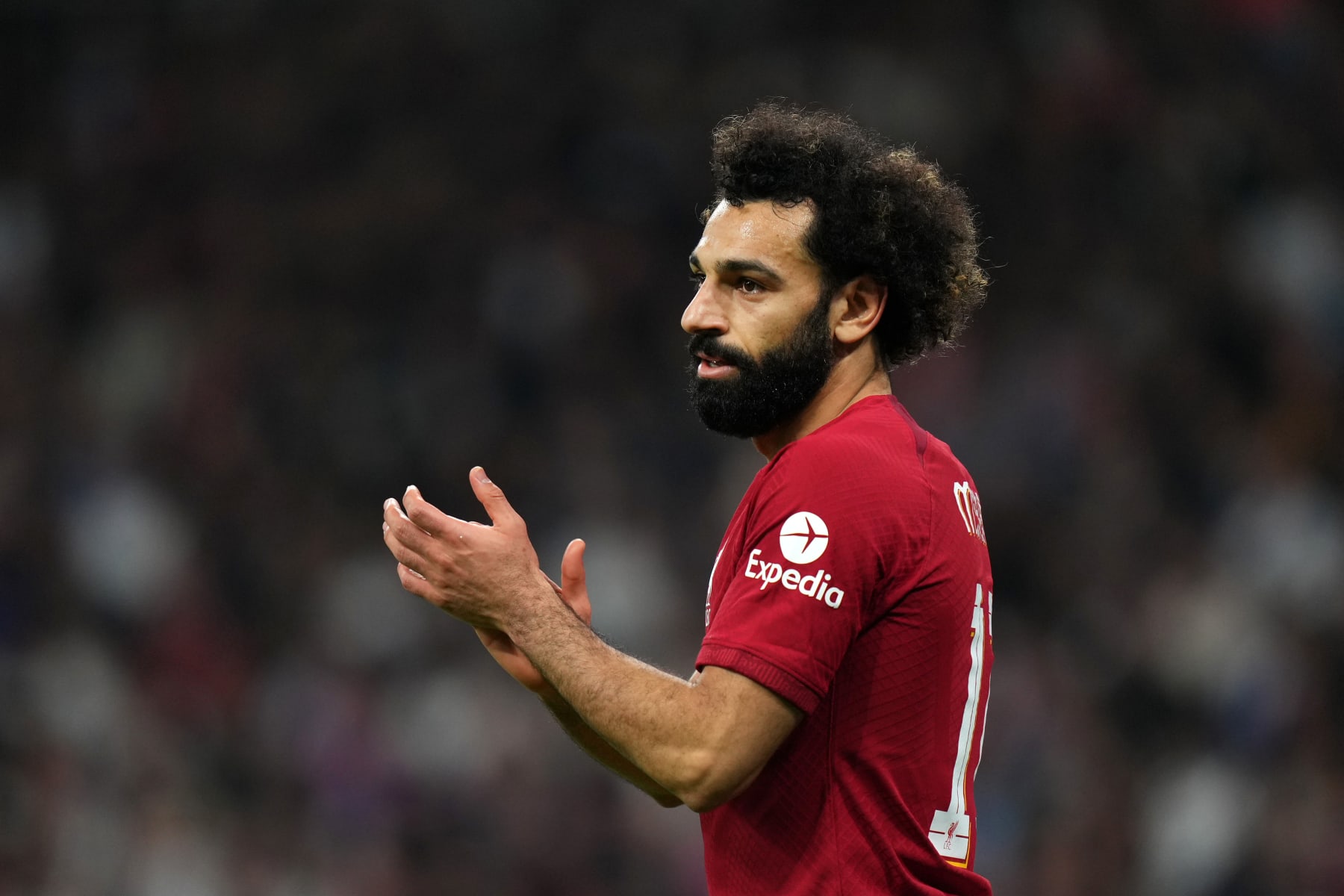 MADRID, SPAIN - MARCH 15: Mohamed Salah of Liverpool applauds during the UEFA Champions League round of 16 leg two match between Real Madrid and Liverpool FC at Estadio Santiago Bernabeu on March 15, 2023 in Madrid, Spain. (Photo by Angel Martinez/Getty Images)