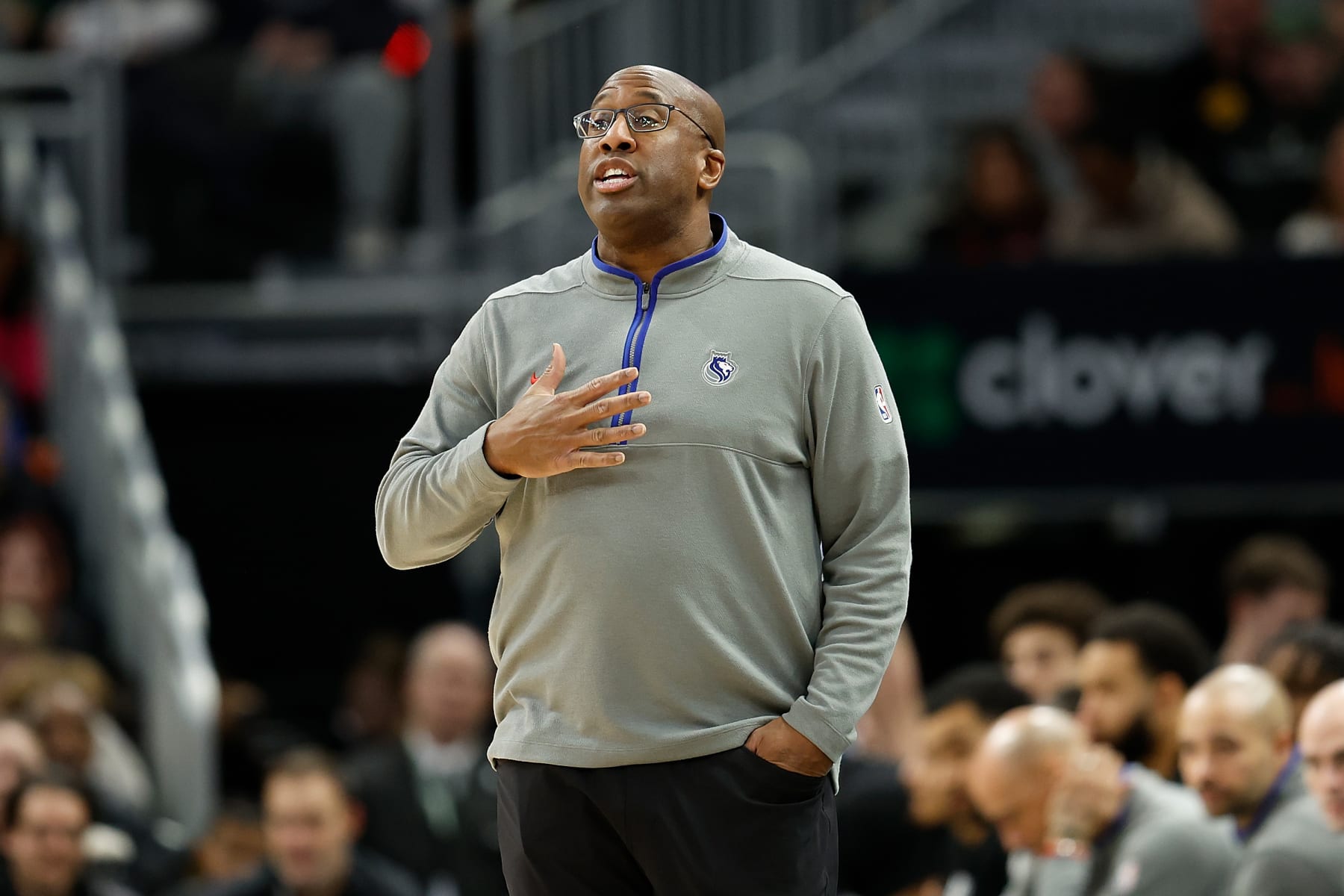 MILWAUKEE, WISCONSIN - JANUARY 14: Mike Brown head coach of the Sacramento Kings looks on during the first half of the game against the Milwaukee Bucks at Fiserv Forum on January 14, 2024 in Milwaukee, Wisconsin. NOTE TO USER: User expressly acknowledges and agrees that, by downloading and or using this photograph, User is consenting to the terms and conditions of the Getty Images License Agreement. (Photo by John Fisher/Getty Images)