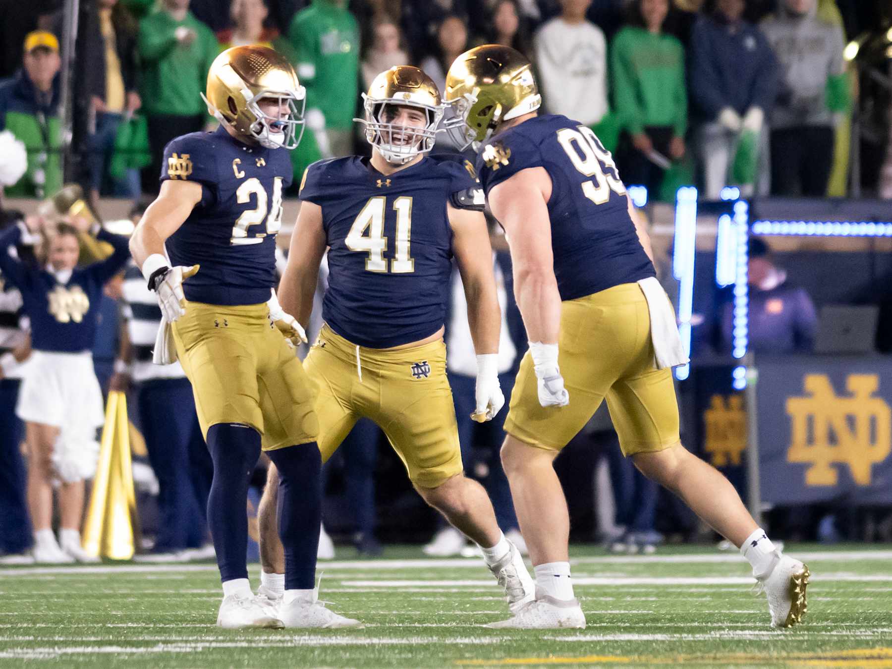 SOUTH BEND, IN - NOVEMBER 09: Notre Dame Fighting Irish linebacker Jack Kiser (24) celebrates after a play with his teammates during the game between the Notre Dame Fighting Irish and the  Florida State Seminoles at Notre Dame Stadium in South Bend, IN on November 9 2024. (Photo by Joseph Weiser/Icon Sportswire via Getty Images)