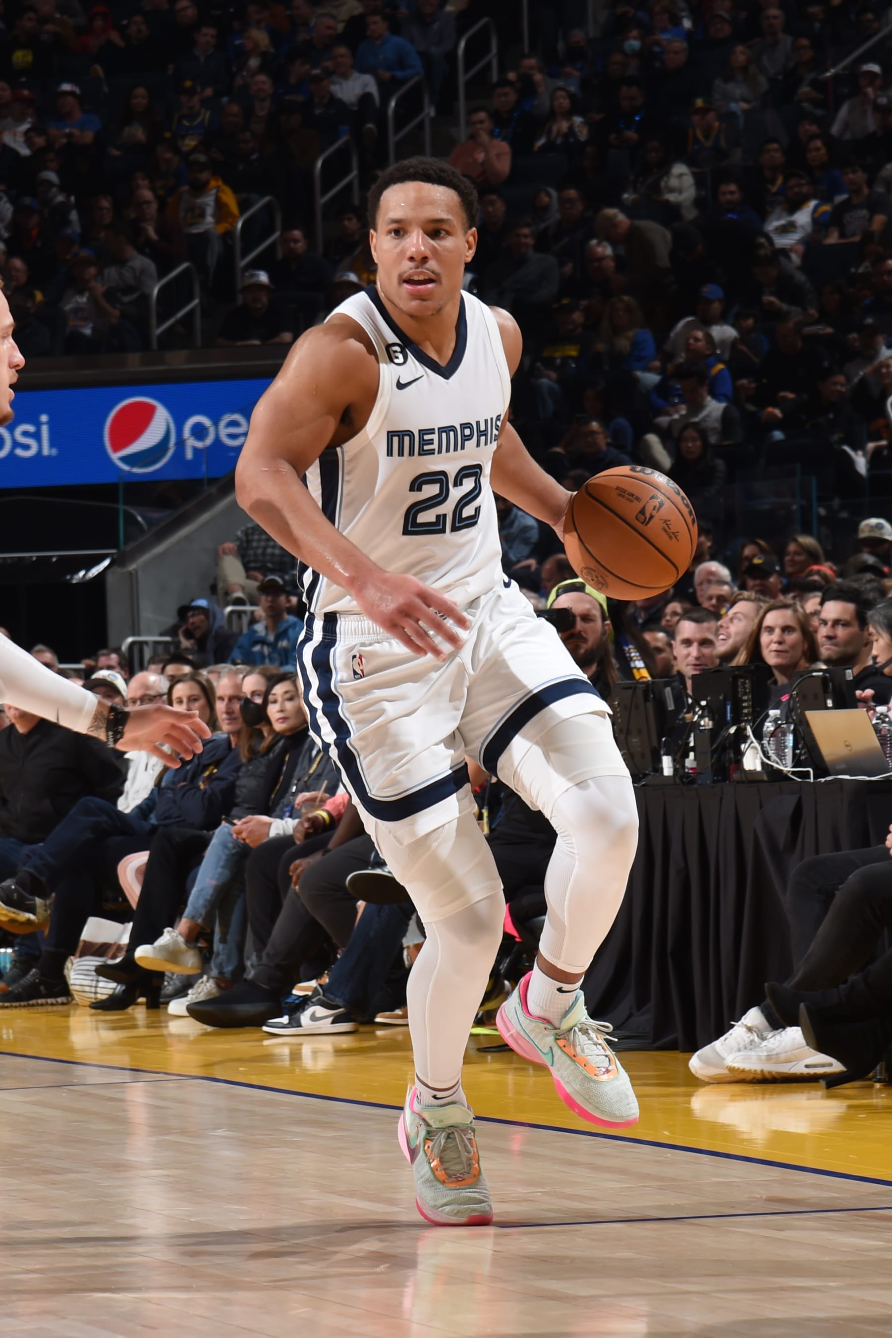 SAN FRANCISCO, CA - JANUARY 25: Desmond Bane #22 of the Memphis Grizzlies dribbles the ball during the game against the Golden State Warriors on January 25, 2023 at Chase Center in San Francisco, California. NOTE TO USER: User expressly acknowledges and agrees that, by downloading and or using this photograph, user is consenting to the terms and conditions of Getty Images License Agreement. Mandatory Copyright Notice: Copyright 2023 NBAE (Photo by Noah Graham/NBAE via Getty Images)