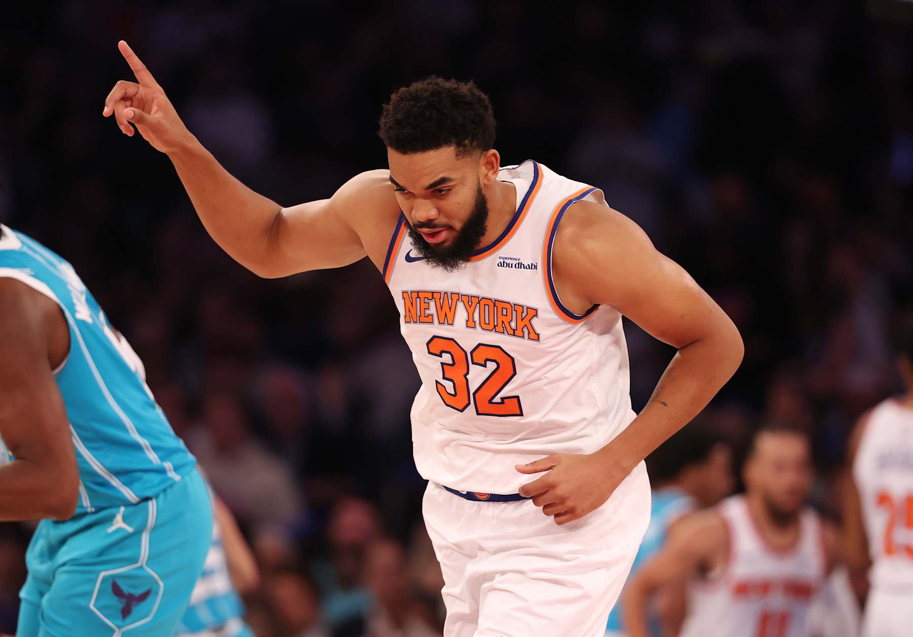 NEW YORK, NEW YORK - DECEMBER 05:  Karl-Anthony Towns #32 of the New York Knicks celebrates a basket against the Charlotte Hornets during their game at Madison Square Garden on December 05, 2024 in New York City.  User expressly acknowledges and agrees that, by downloading and or using this photograph, User is consenting to the terms and conditions of the Getty Images License Agreement.  (Photo by Al Bello/Getty Images)