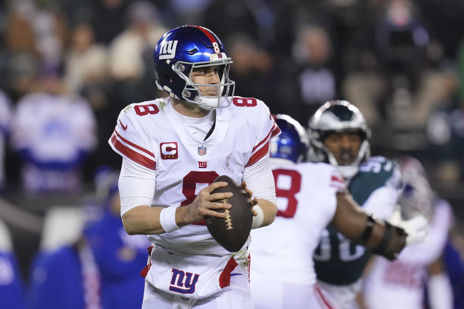 PHILADELPHIA, PA - JANUARY 21: Daniel Jones #8 of the New York Giants scrambles against the Philadelphia Eagles during the NFC Divisional Playoff game at Lincoln Financial Field on January 21, 2023 in Philadelphia, Pennsylvania. (Photo by Mitchell Leff/Getty Images)