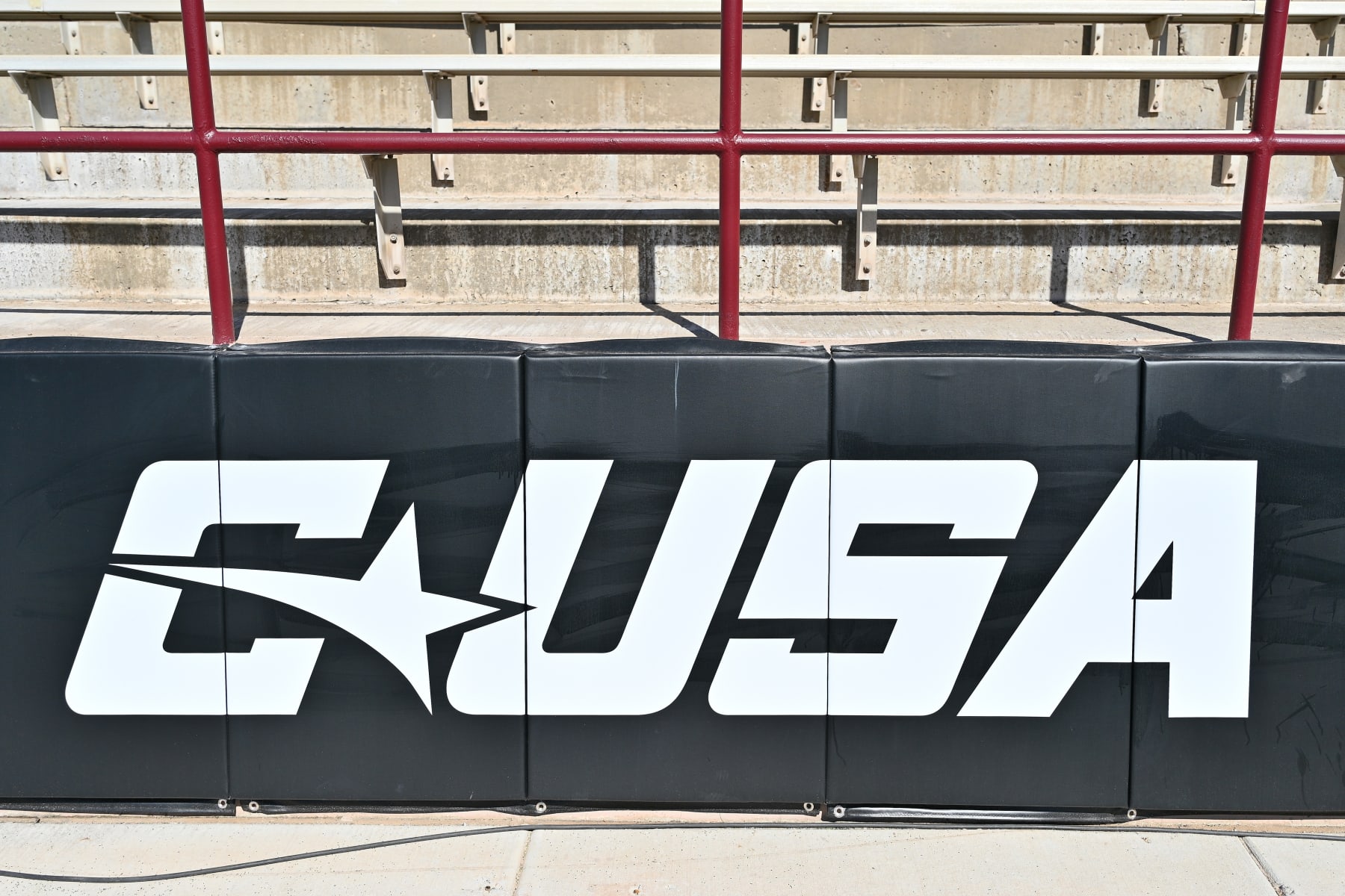 LAS CRUCES, NEW MEXICO - AUGUST 26: A Conference USA logo is displayed on a padded wall before a game between the Massachusetts Minutemen and the New Mexico State Aggies at Aggie Memorial Stadium on August 26, 2023 in Las Cruces, New Mexico. (Photo by Sam Wasson/Getty Images)