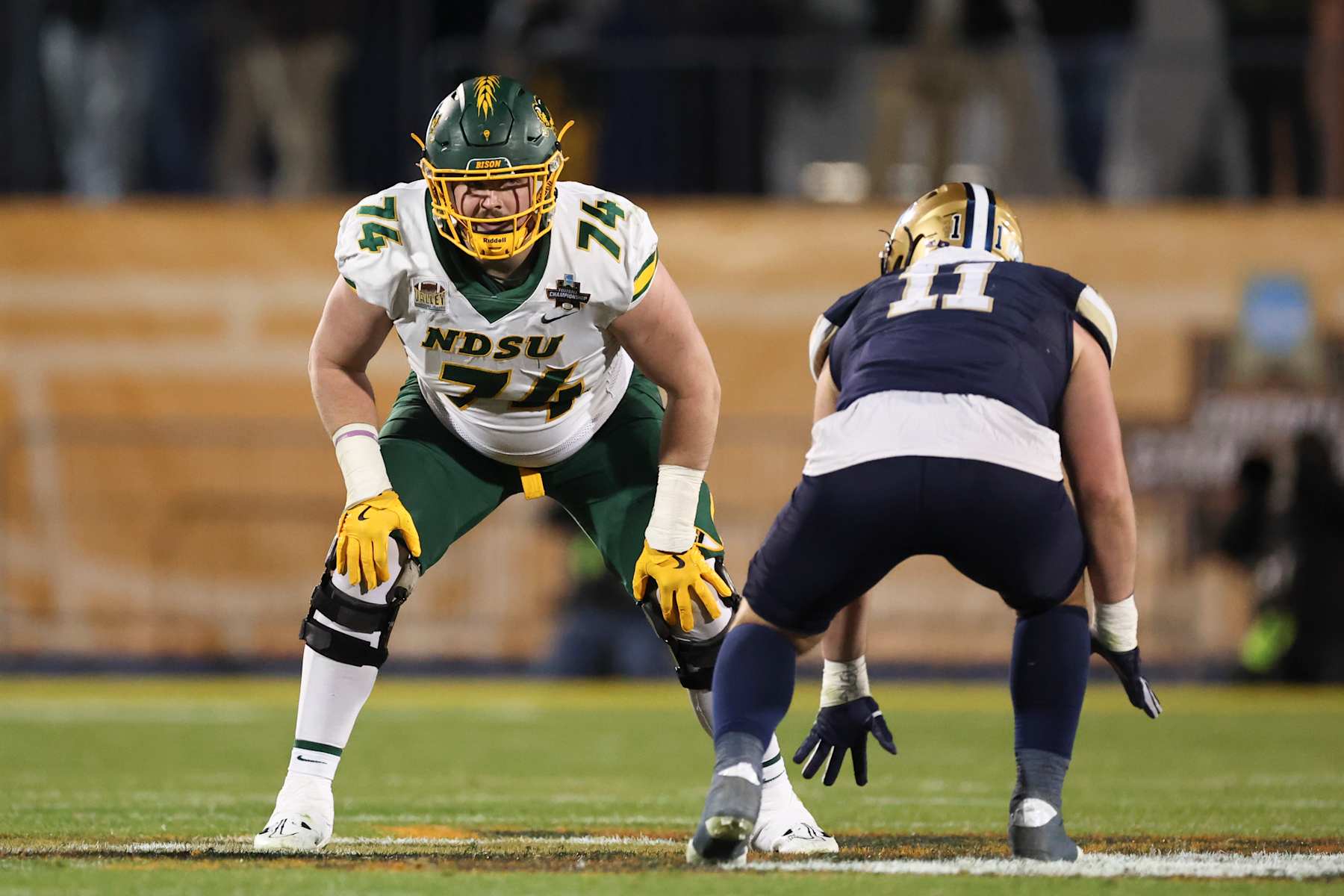 FRISCO, TEXAS - JANUARY 6: Grey Zabel #74 of the North Dakota State Bison lines up against Kenneth Eiden IV #11 of the Montana State Bobcats during the second half of the Division I FCS Football Championship held at Toyota Stadium on January 6, 2025 in Frisco, Texas. (Photo by Justin Tafoya/NCAA Photos via Getty Images)