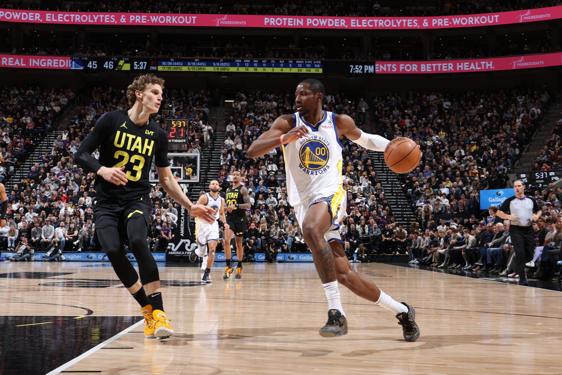 SALT LAKE CITY, UT - FEBRUARY 12: Jonathan Kuminga #00 of the Golden State Warriors dribbles the ball during the game against the Utah Jazz on February 12, 2024 at Delta Center in Salt Lake City, Utah. NOTE TO USER: User expressly acknowledges and agrees that, by downloading and or using this Photograph, User is consenting to the terms and conditions of the Getty Images License Agreement. Mandatory Copyright Notice: Copyright 2024 NBAE (Photo by Melissa Majchrzak/NBAE via Getty Images)